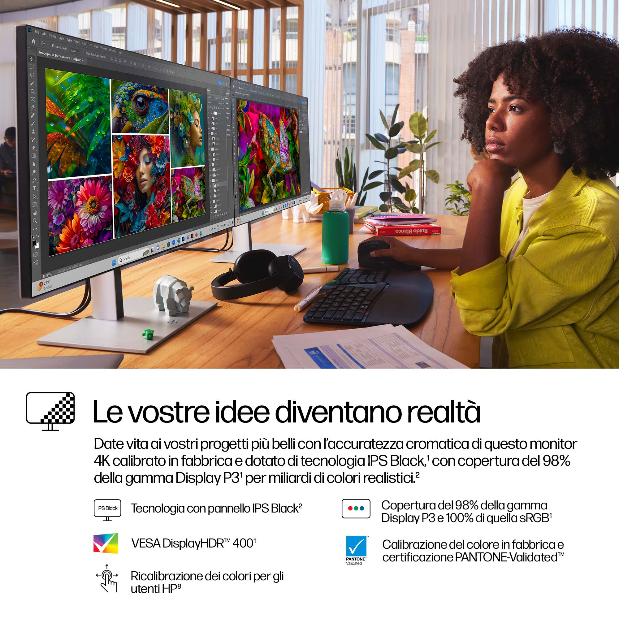 Mujer mirando un monitor con dos pantallas.