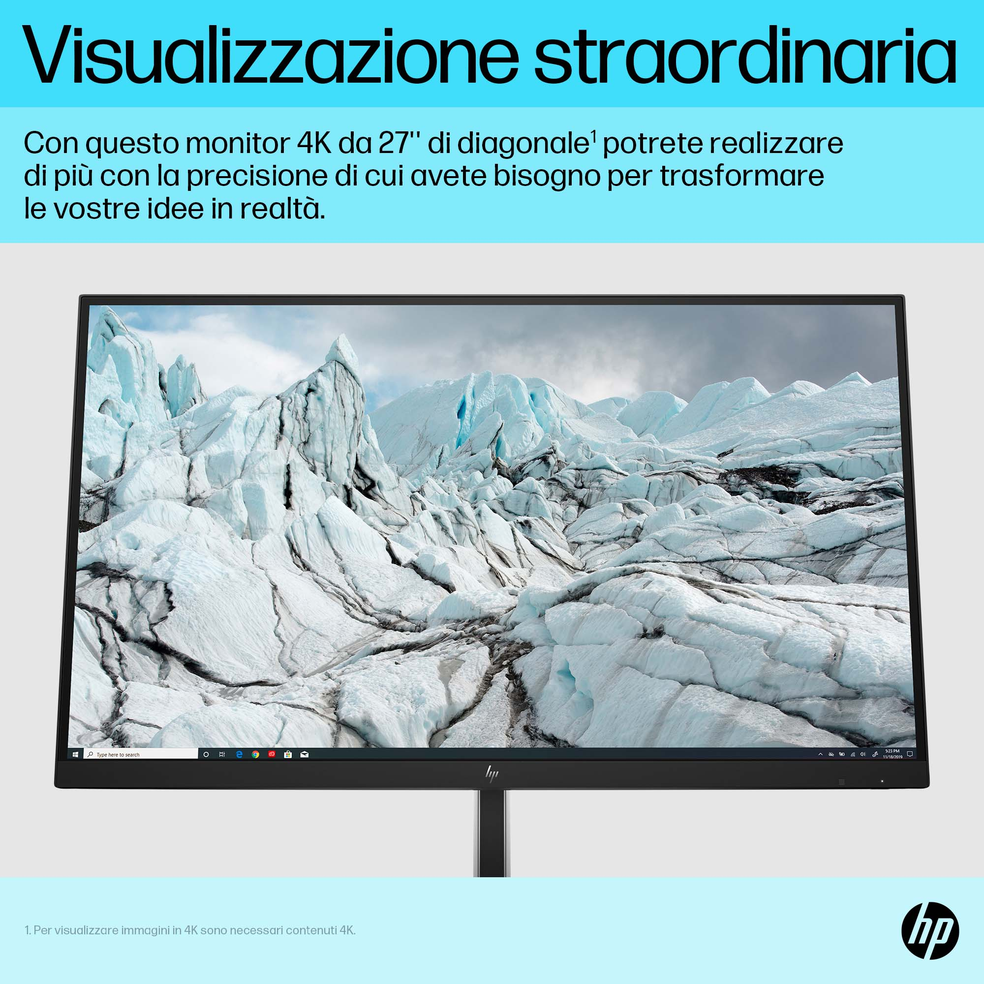 Un monitor negro con un paisaje montañoso en la pantalla y el logotipo de HP.
