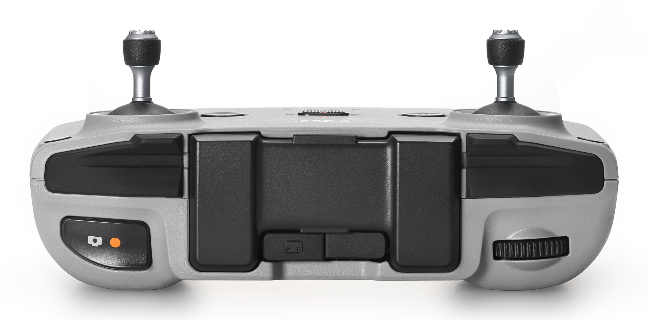 Szary kontroler drona z joystickami i przyciskami na białym tle.
