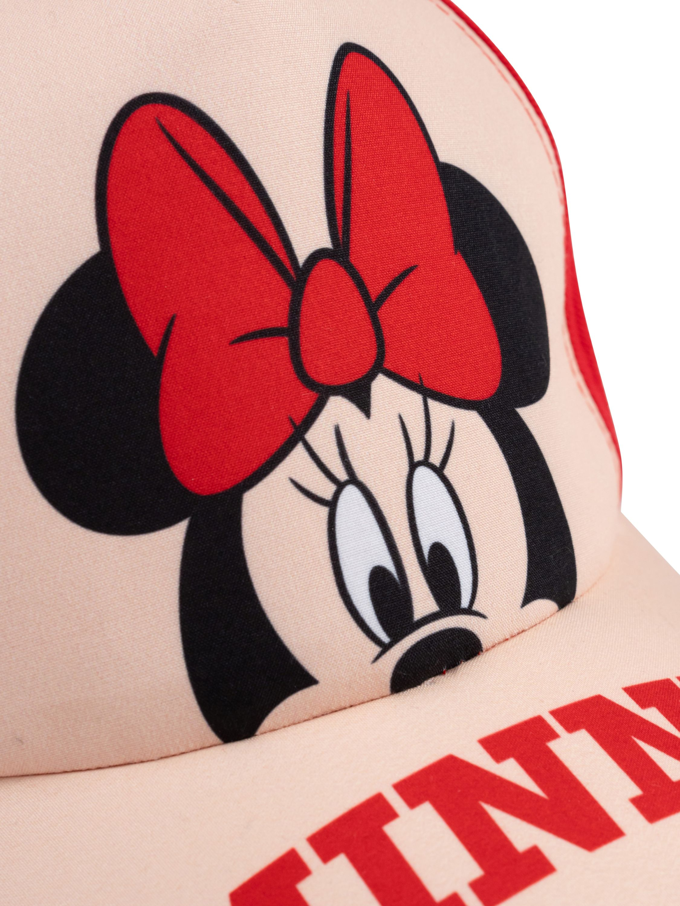 Nahaufnahme einer rosa und roten Minnie Mouse Mütze. Das Wort MINNIE steht auf der Mütze.