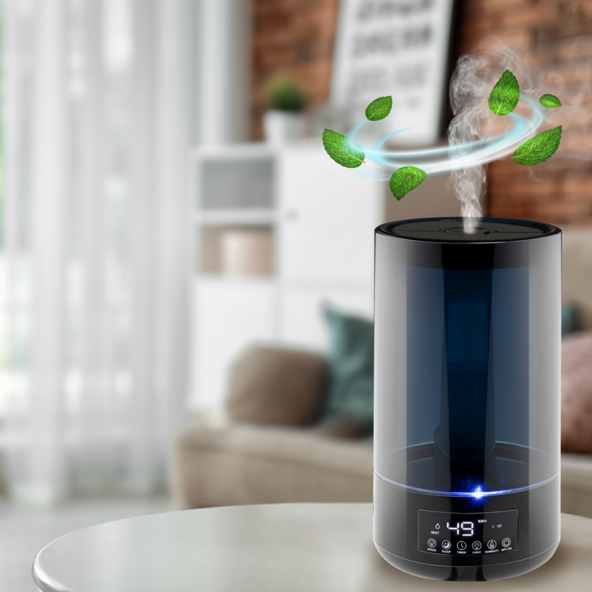 Black and blue humidifier, with mint leaves around it. A table and couch in the background.