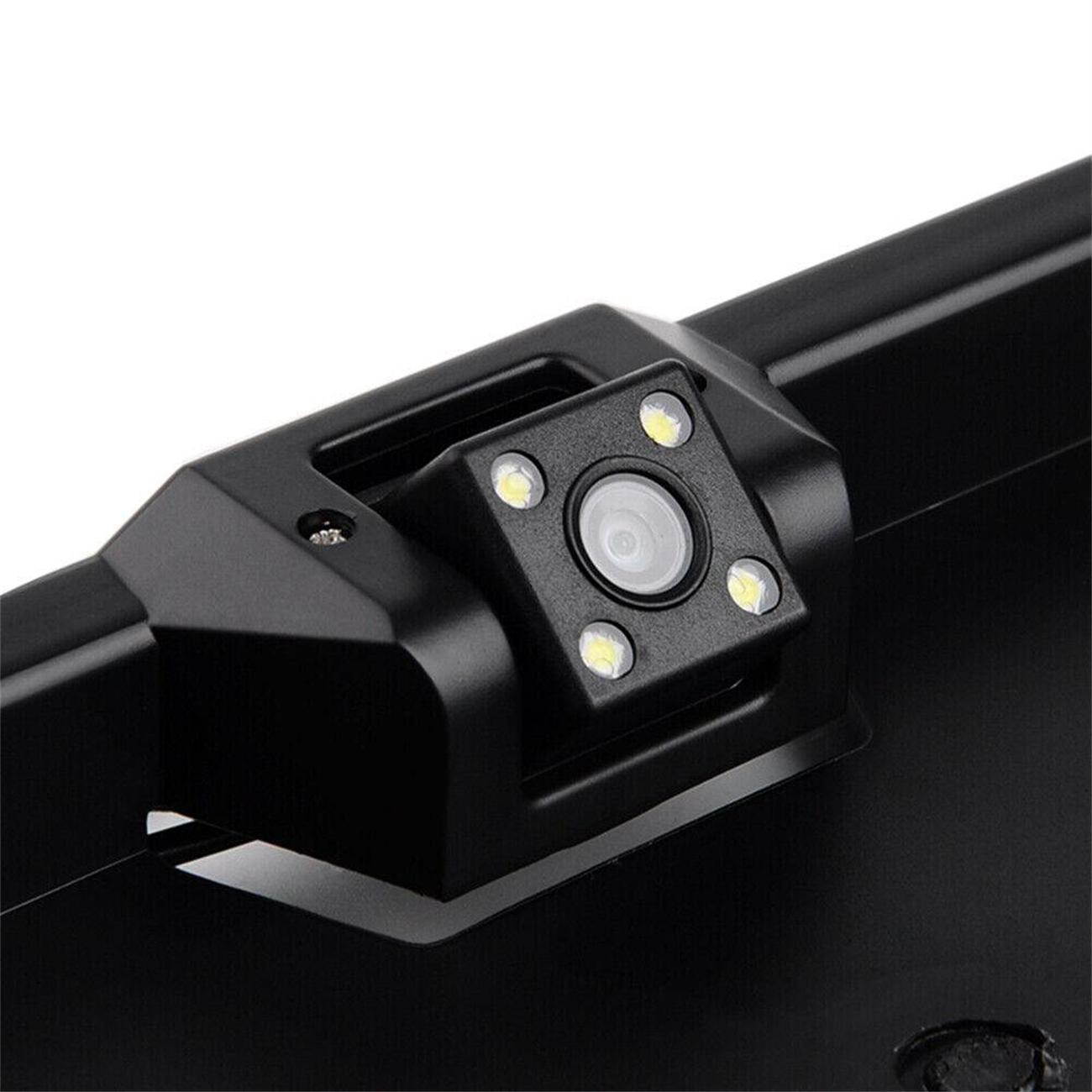 Schwarze quadratische Kamera mit 4 LED-Leuchten. Sie ist auf einer schwarzen Platte montiert.
