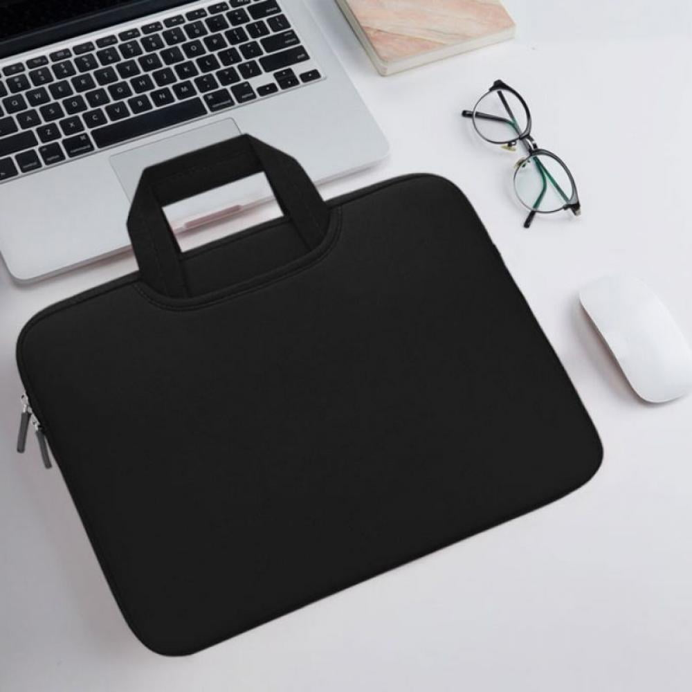 Schwarze Laptoptasche auf einem weißen Schreibtisch.
