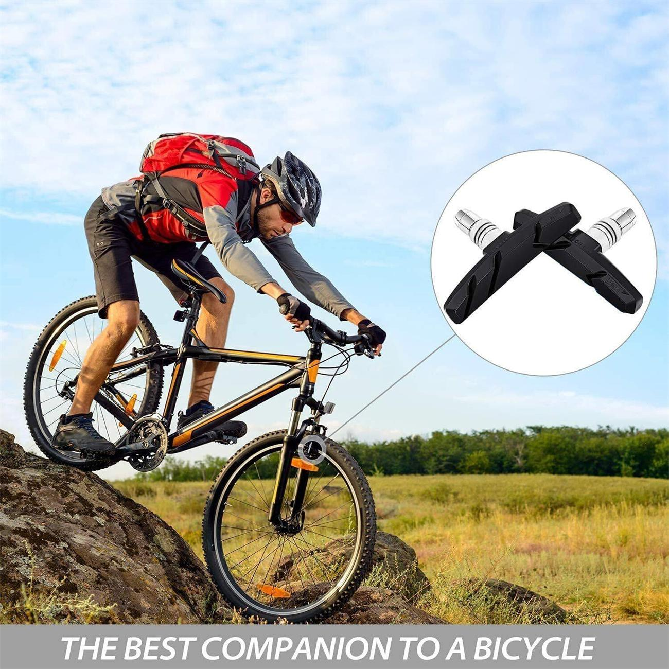 Ein Radfahrer fährt ein schwarzes Mountainbike. Bremsbeläge werden in einem Kreis gezeigt. Der Text lautet "THE BEST COMPANION TO A BICYCLE".