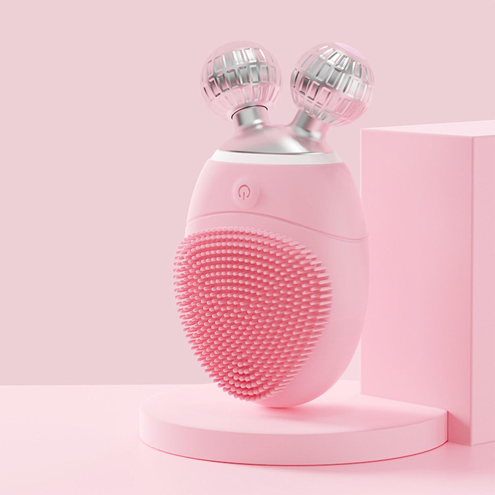 Ein pinkfarbenes Gesichtsmassagegerät mit zwei silbernen Kugeln und einem pinkfarbenen Ständer.