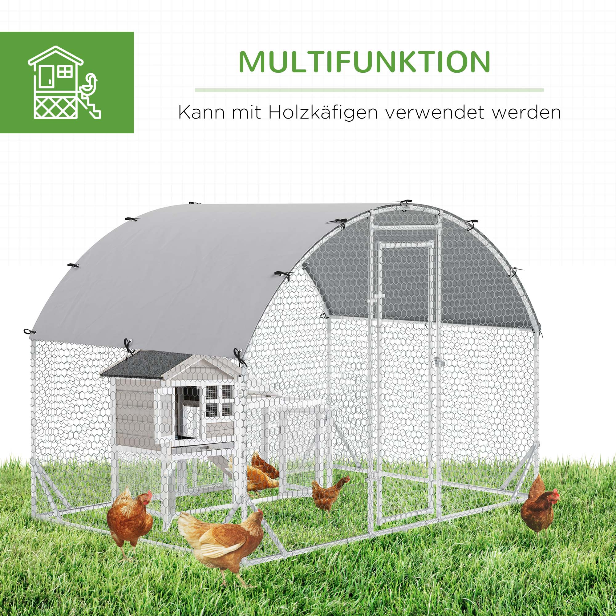 Hühnerstall mit grauem Dach und kleinem Haus. Hühner sind im Gras.