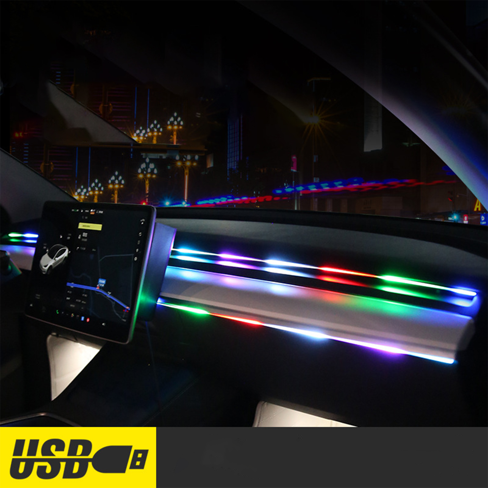 Autoinnenraum mit farbigen LED-Leuchten auf dem Armaturenbrett. Ein Bildschirm ist links zu sehen.
