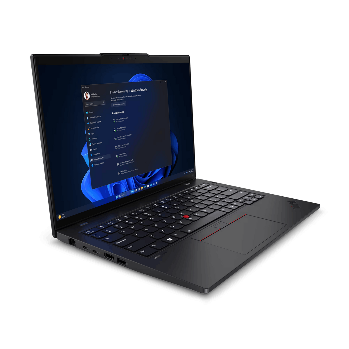 Czarny laptop, otwarty, wyświetlający Windows Security, z klawiaturą.