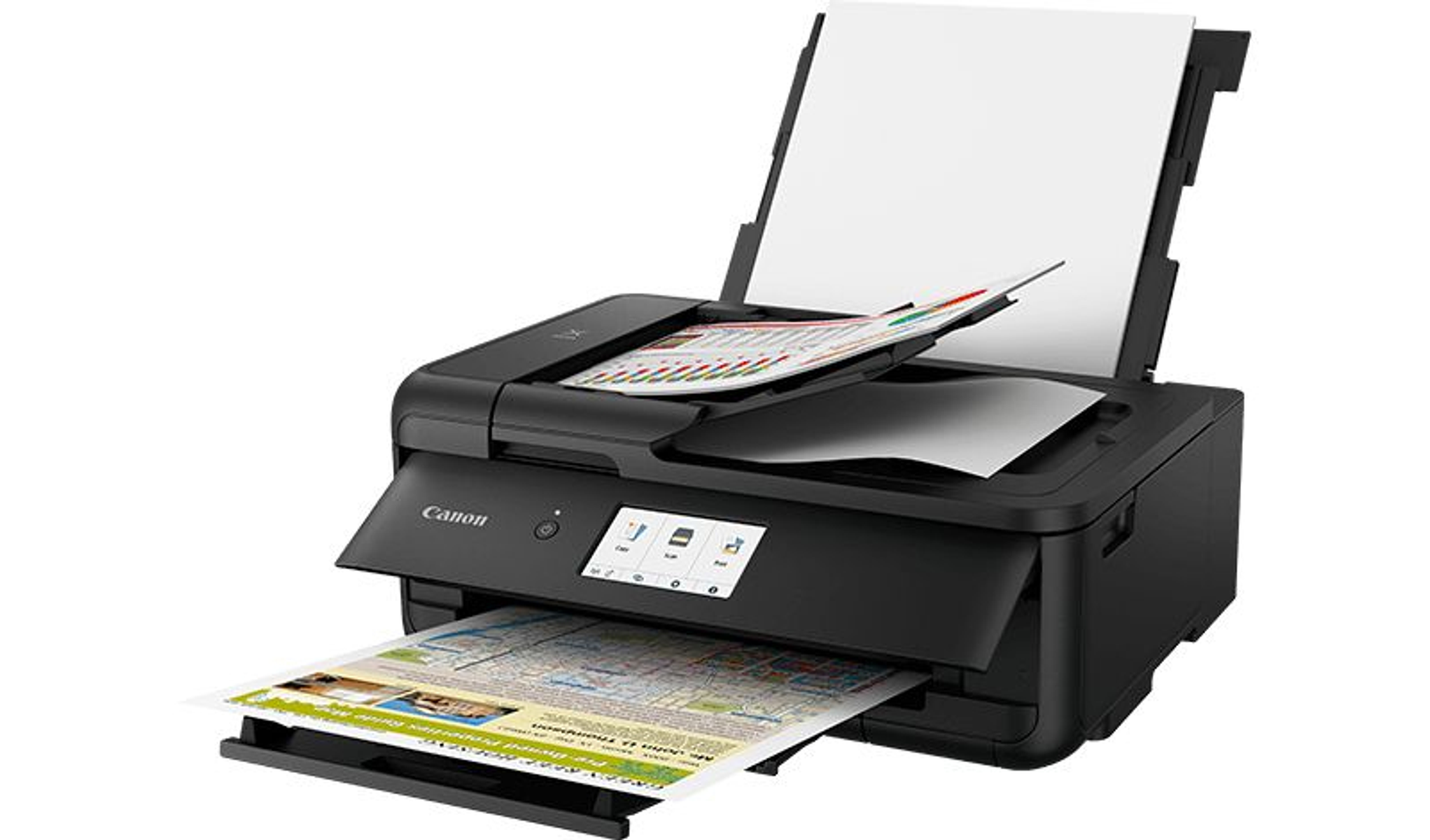 Stampante Canon nera con uscita carta, mostra più stampe a colori.