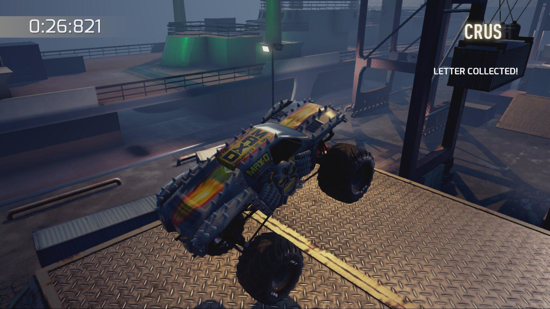 Ein Monstertruck springt über eine Plattform auf einem Industriegelände. Die Spieloberfläche ist sichtbar.
