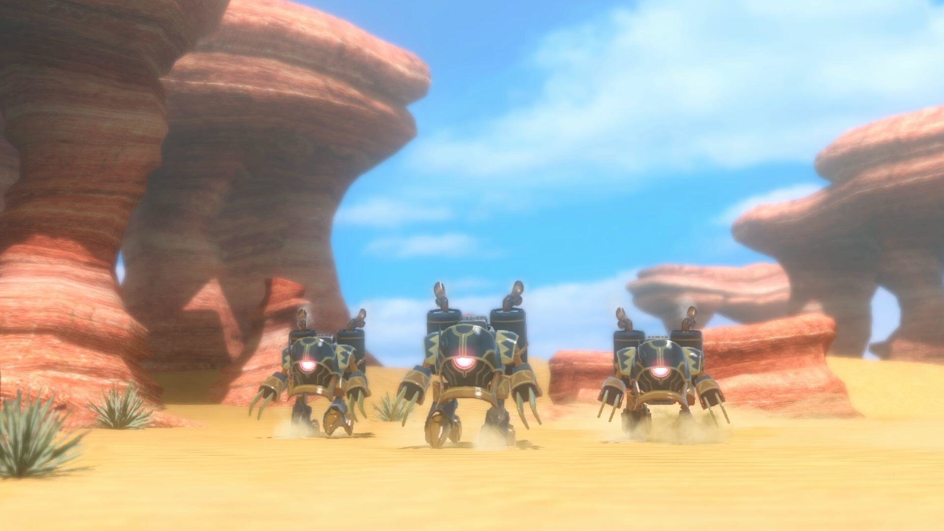 Trzy roboty poruszające się po pustynnym krajobrazie z czerwonymi formacjami skalnymi i błękitnym niebem.