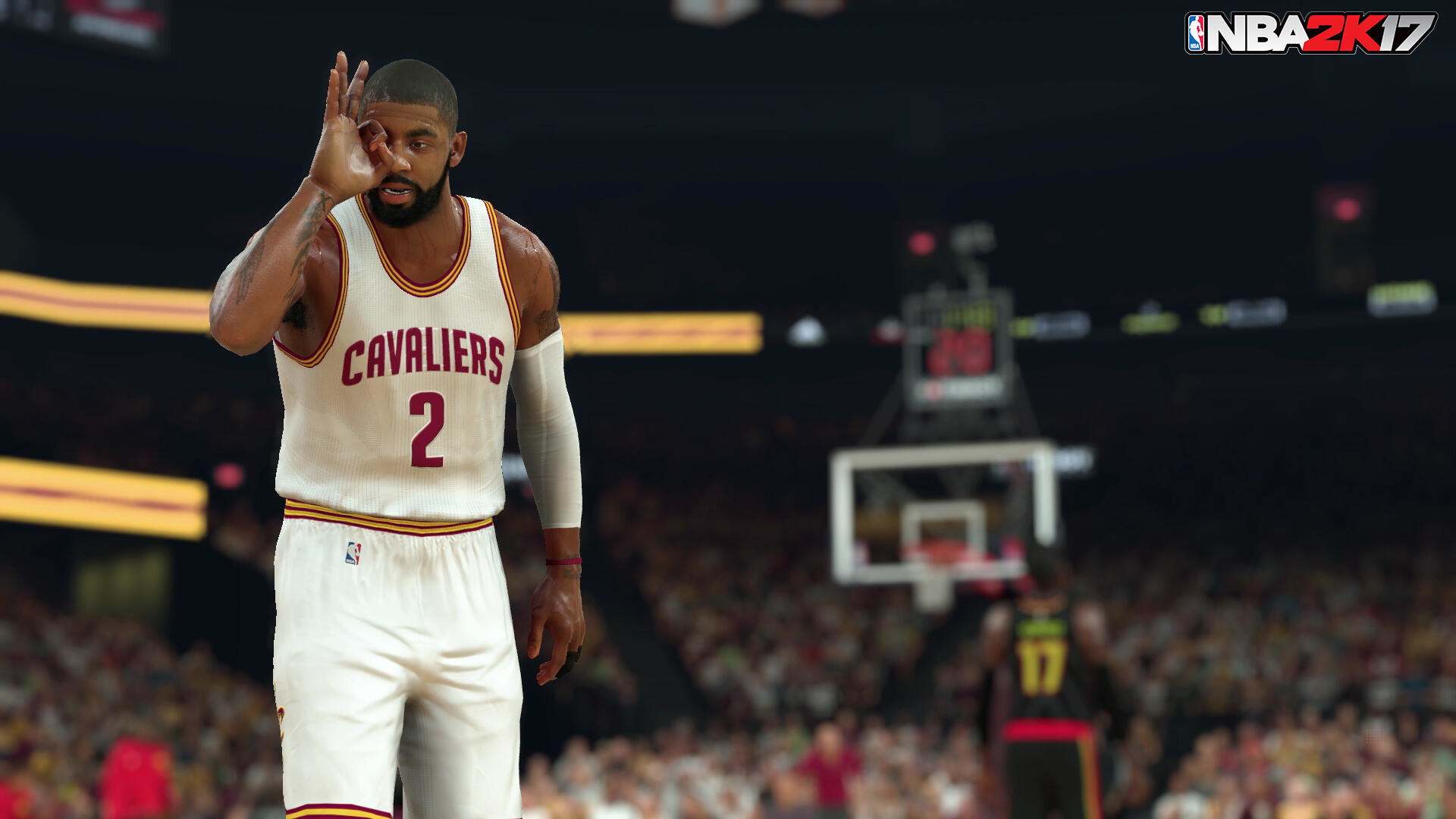 Obraz z NBA 2K17. Koszykarz Kyrie Irving wykonuje gest 'ok'.
