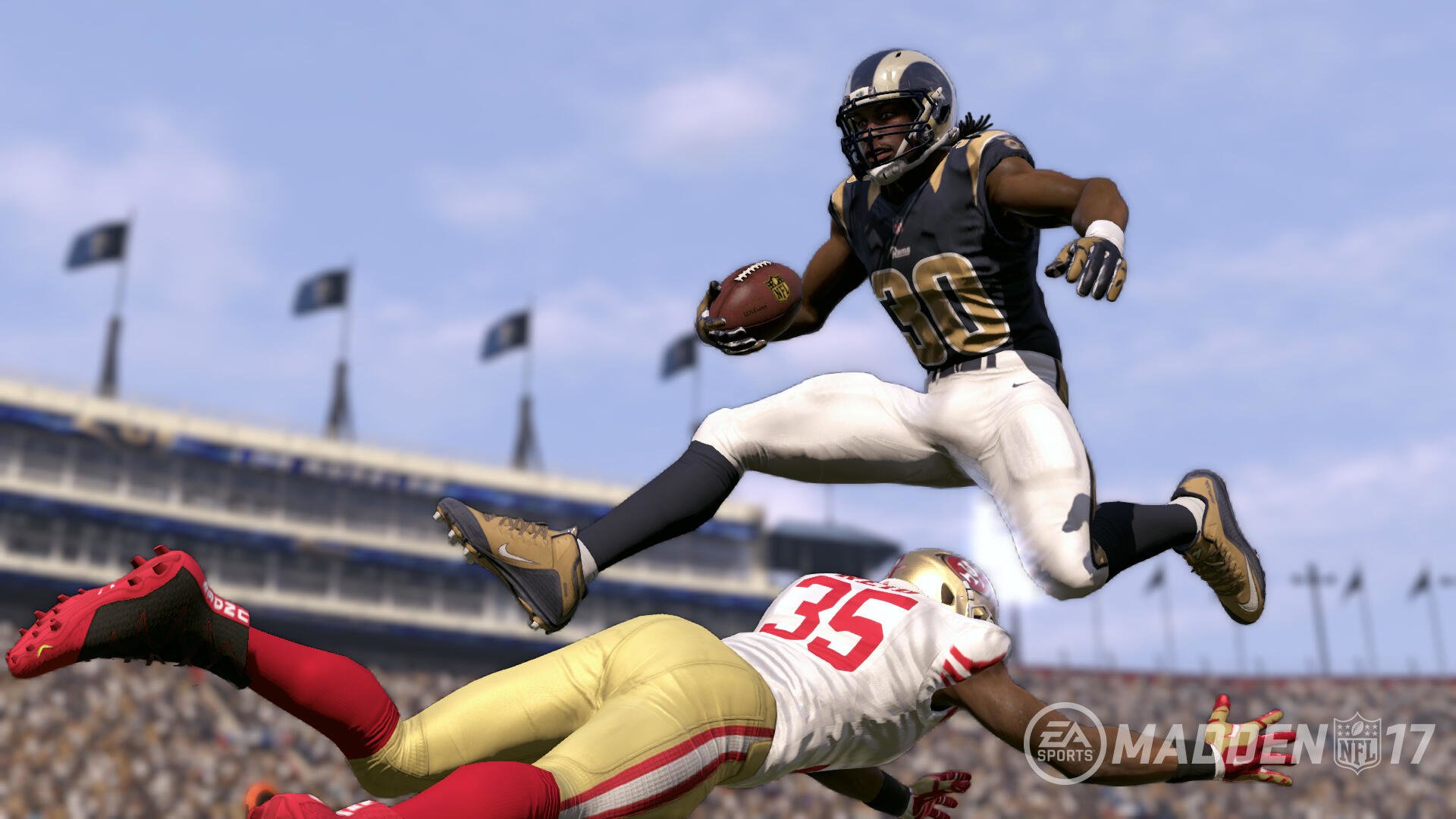 American footballspeler springt over een tacklende speler. De game is Madden NFL 17.