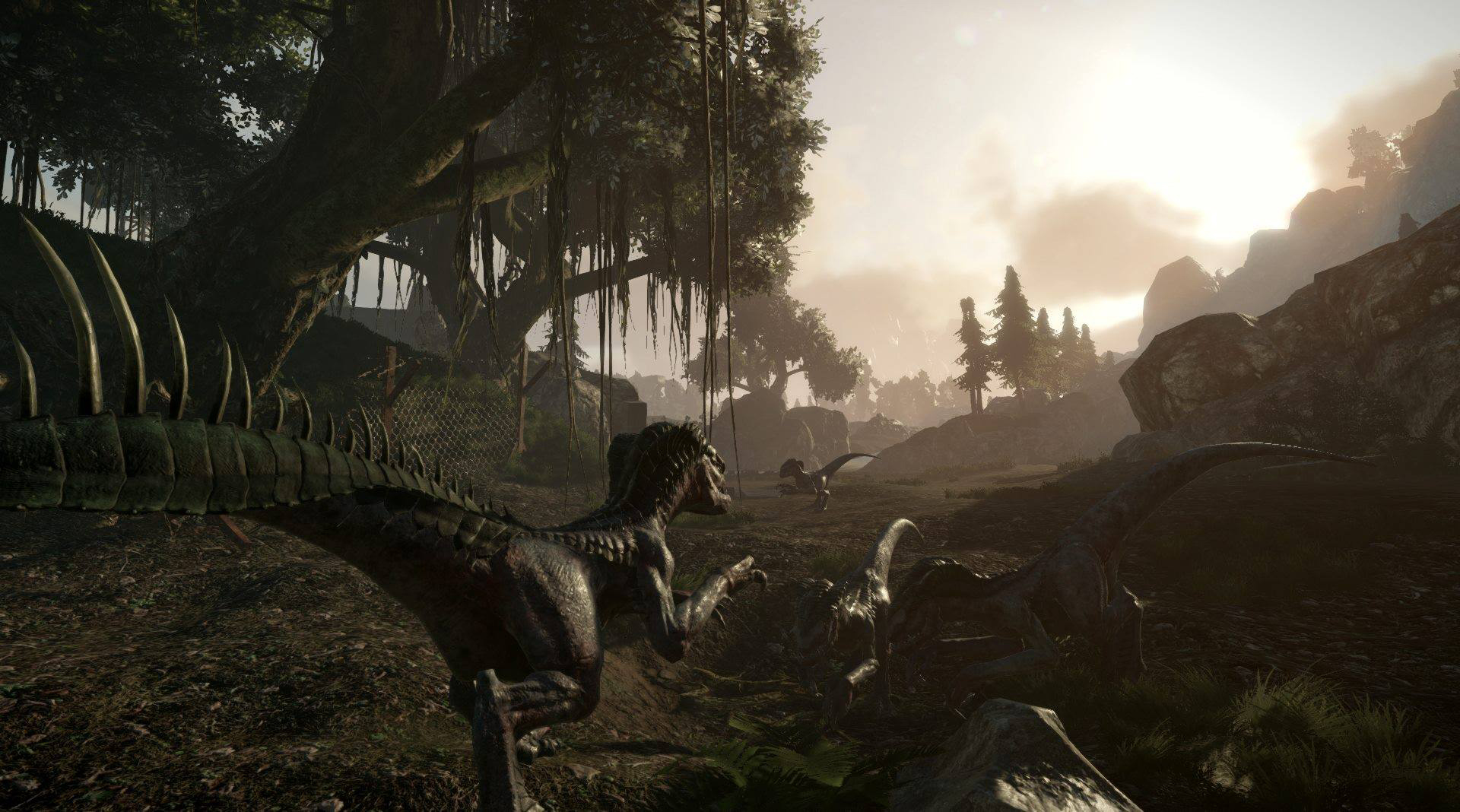 Dinosaurier in einer Waldumgebung, mit Fokus auf einem großen Dinosaurier im Vordergrund.