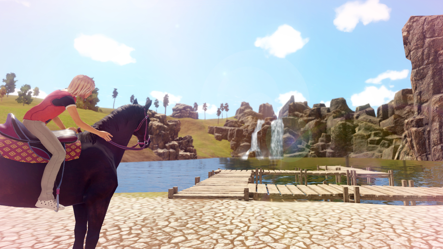 Kobieta jedzie na czarnym koniu nad brzegiem jeziora. W tle pomost i wodospad.