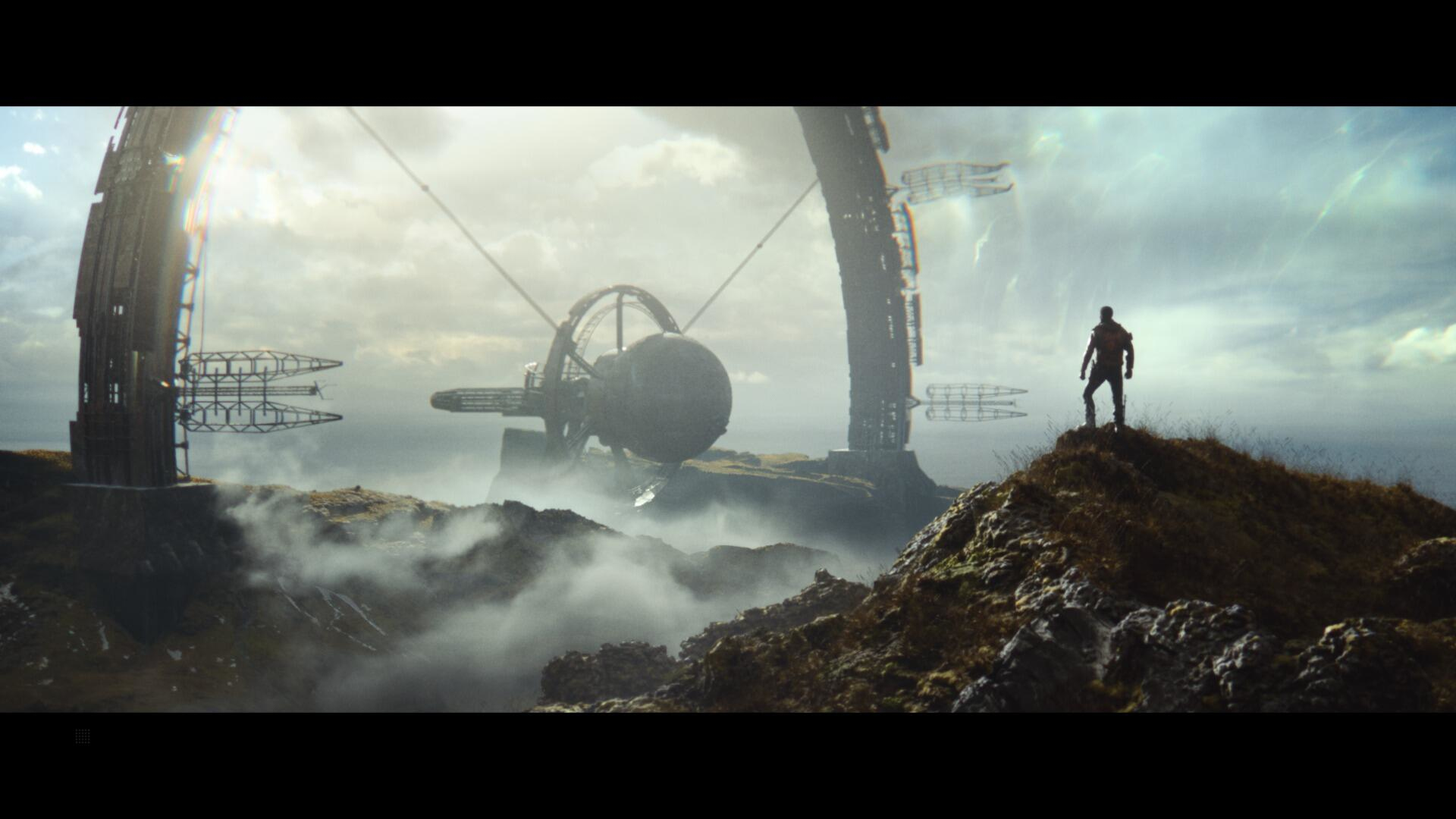 Osoba na klifie patrzy na dużą futurystyczną strukturę. Widoczne niebo.