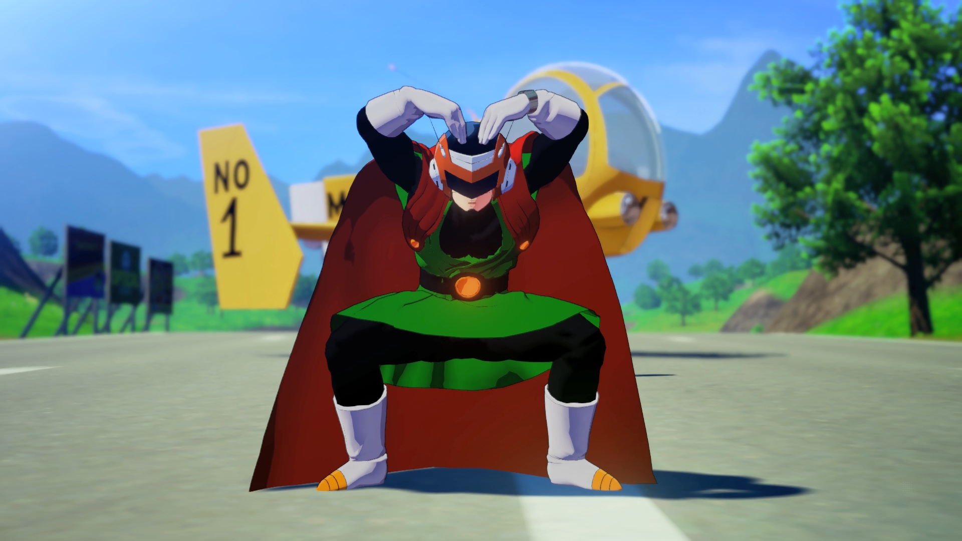 Superbohater w zielono-czerwonym kostiumie pozuje dramatycznie na pasie startowym. W tle helikopter.