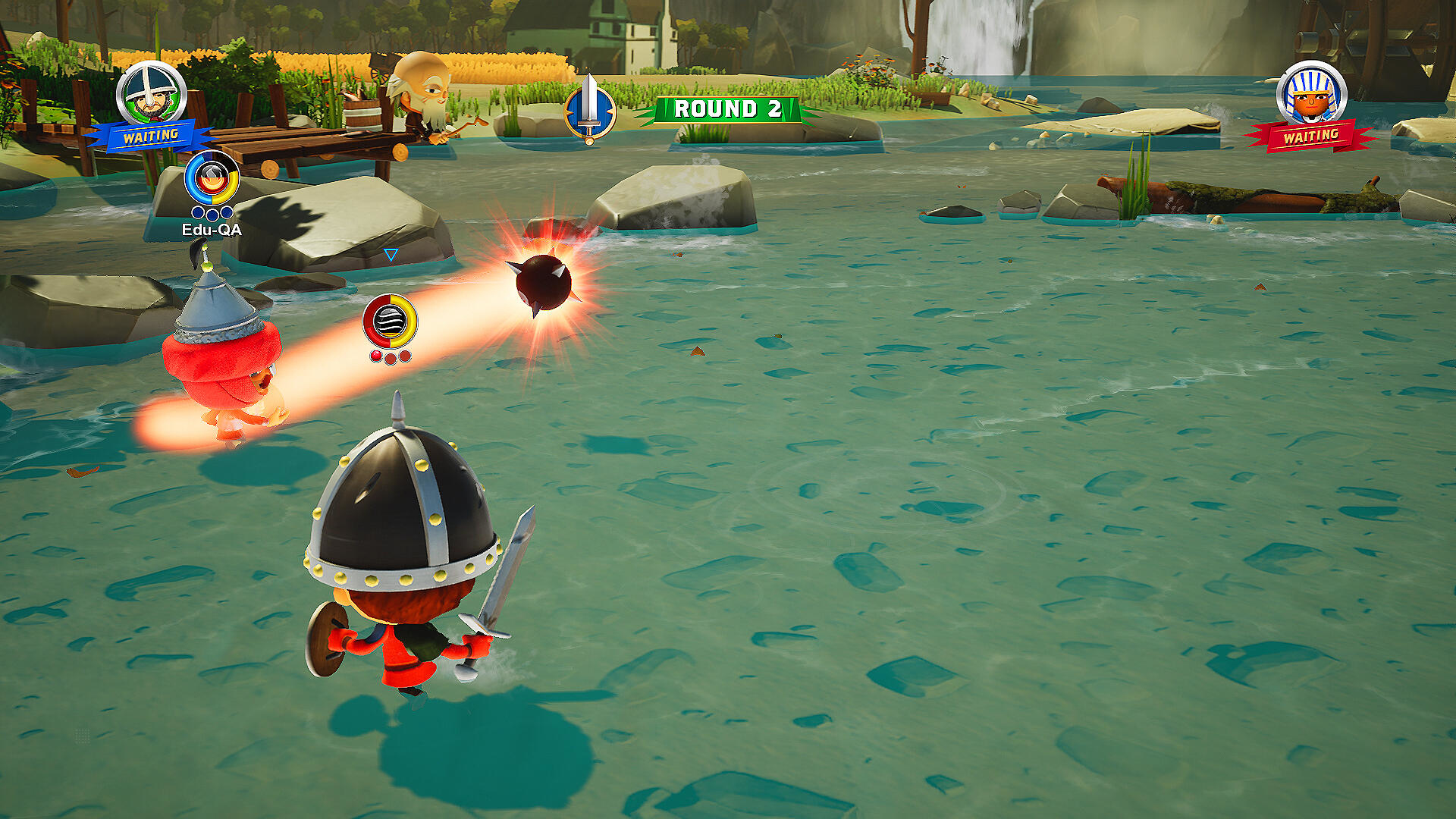 Scena gry z wodą, postaciami i znakiem rundy 2. Postać na pierwszym planie jest czerwona.