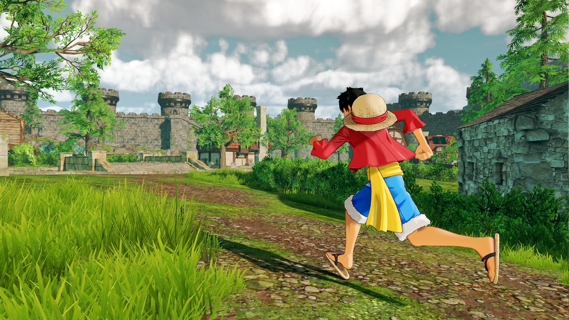 Een man in een rood shirt rent door een grasveld naar een kasteel.