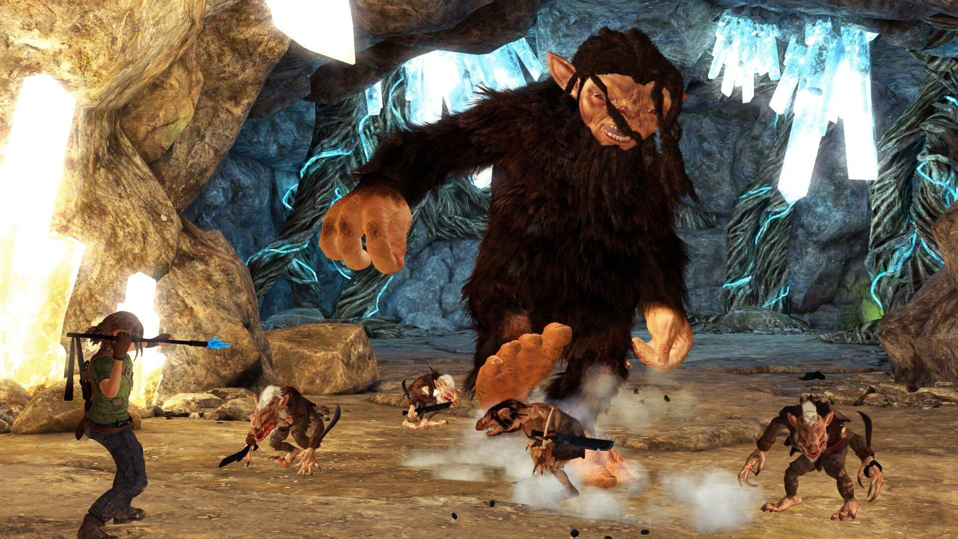 Un grosso troll sta combattendo con un personaggio e alcuni mostri in una grotta.