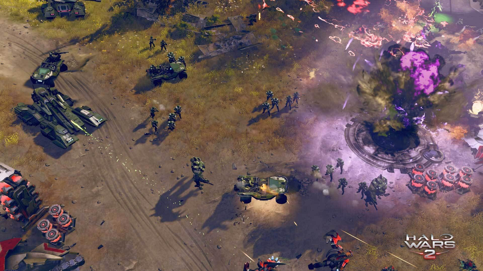 Halo Wars 2-gamescène. Verschillende voertuigen en soldaten op een slagveld met paarse energie-effecten.