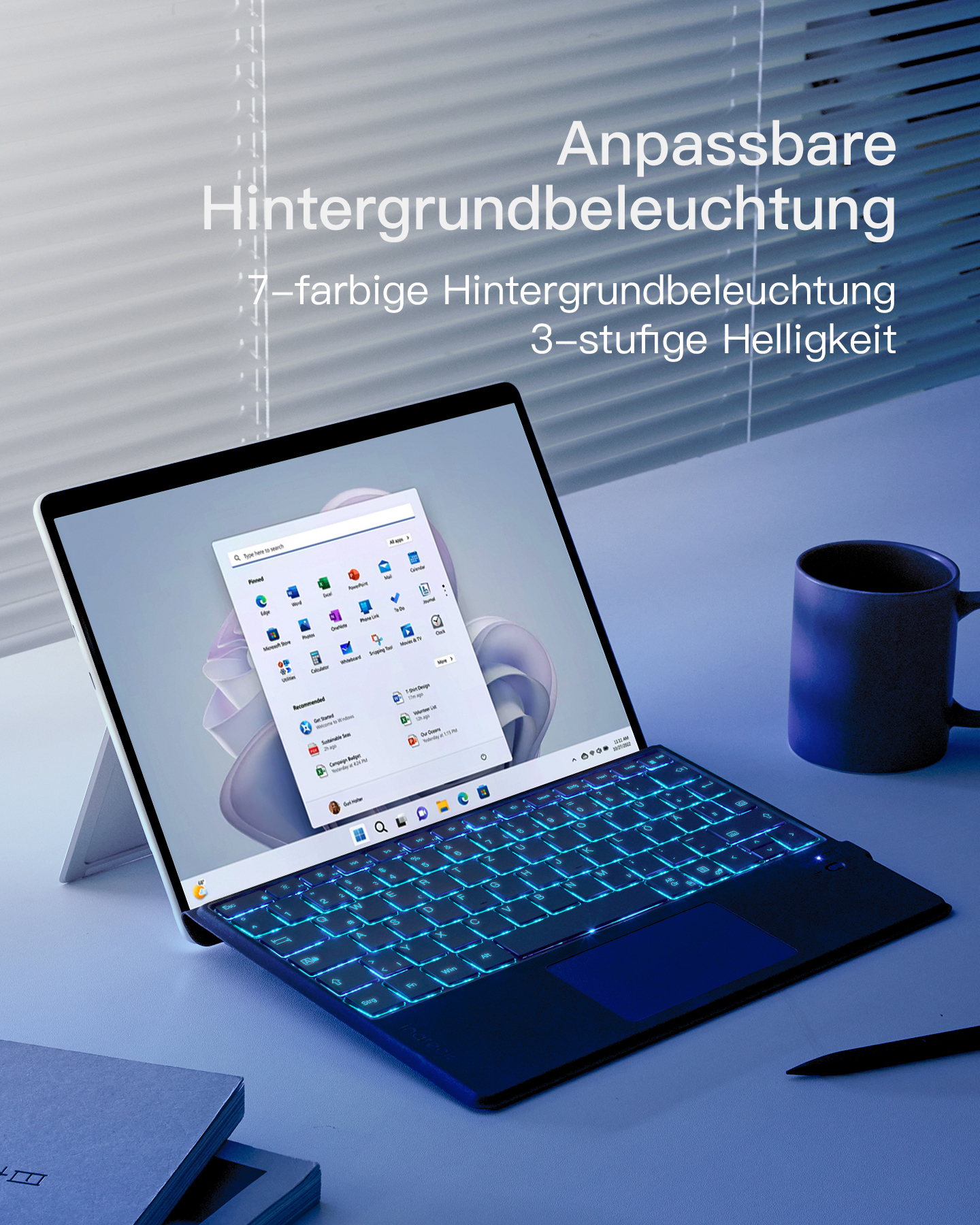 Eine Laptop-Tastatur mit blauen Lichtern und einem Bildschirm, der eine Windows-Oberfläche anzeigt.