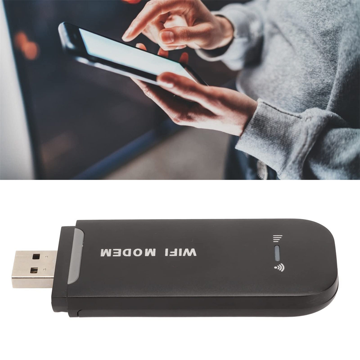 Eine Person, die ein Tablet benutzt, mit einem schwarzen WLAN-Modem im Vordergrund.