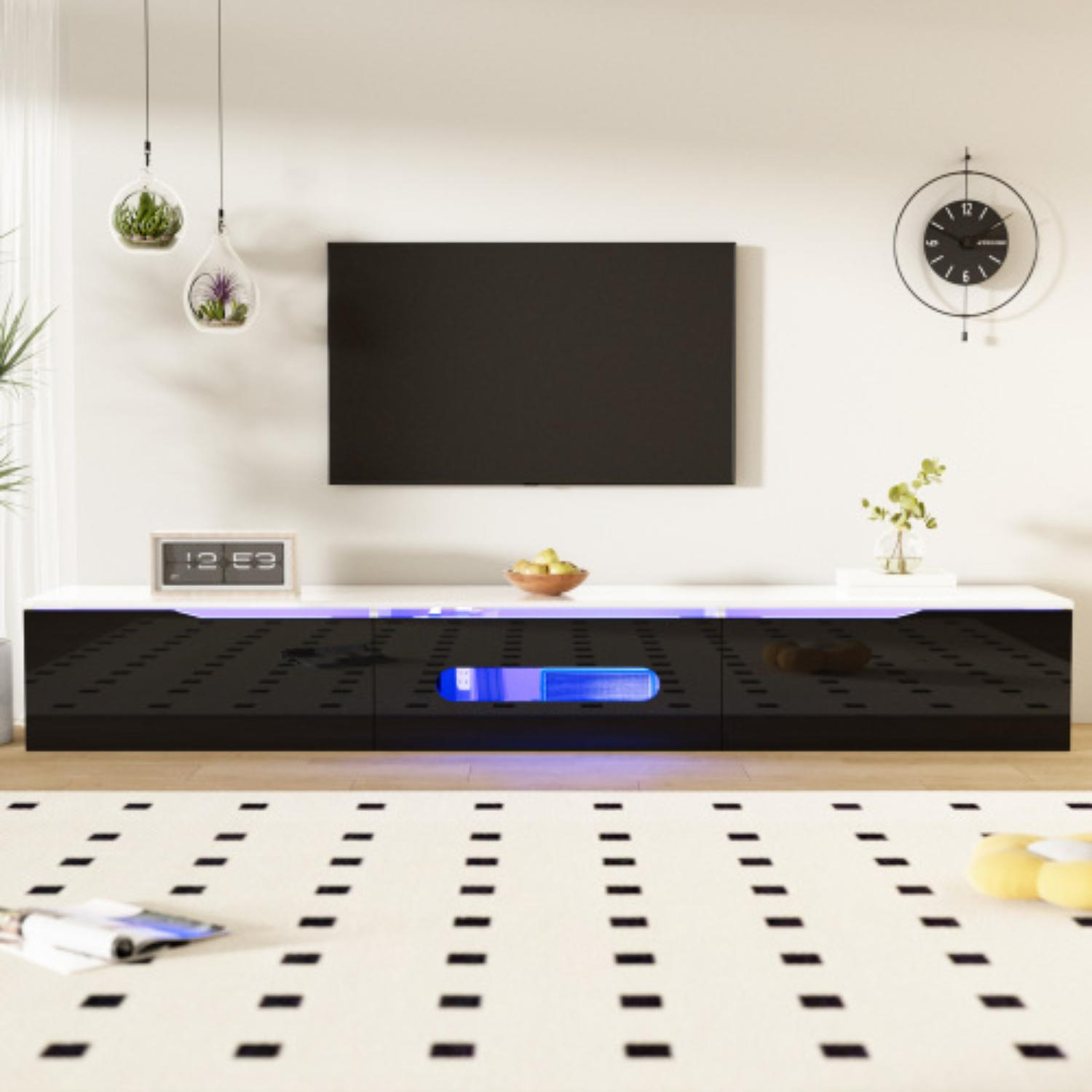 Ein moderner TV-Ständer mit Fernseher. Er hat weiße, schwarze und blaue Lichter.