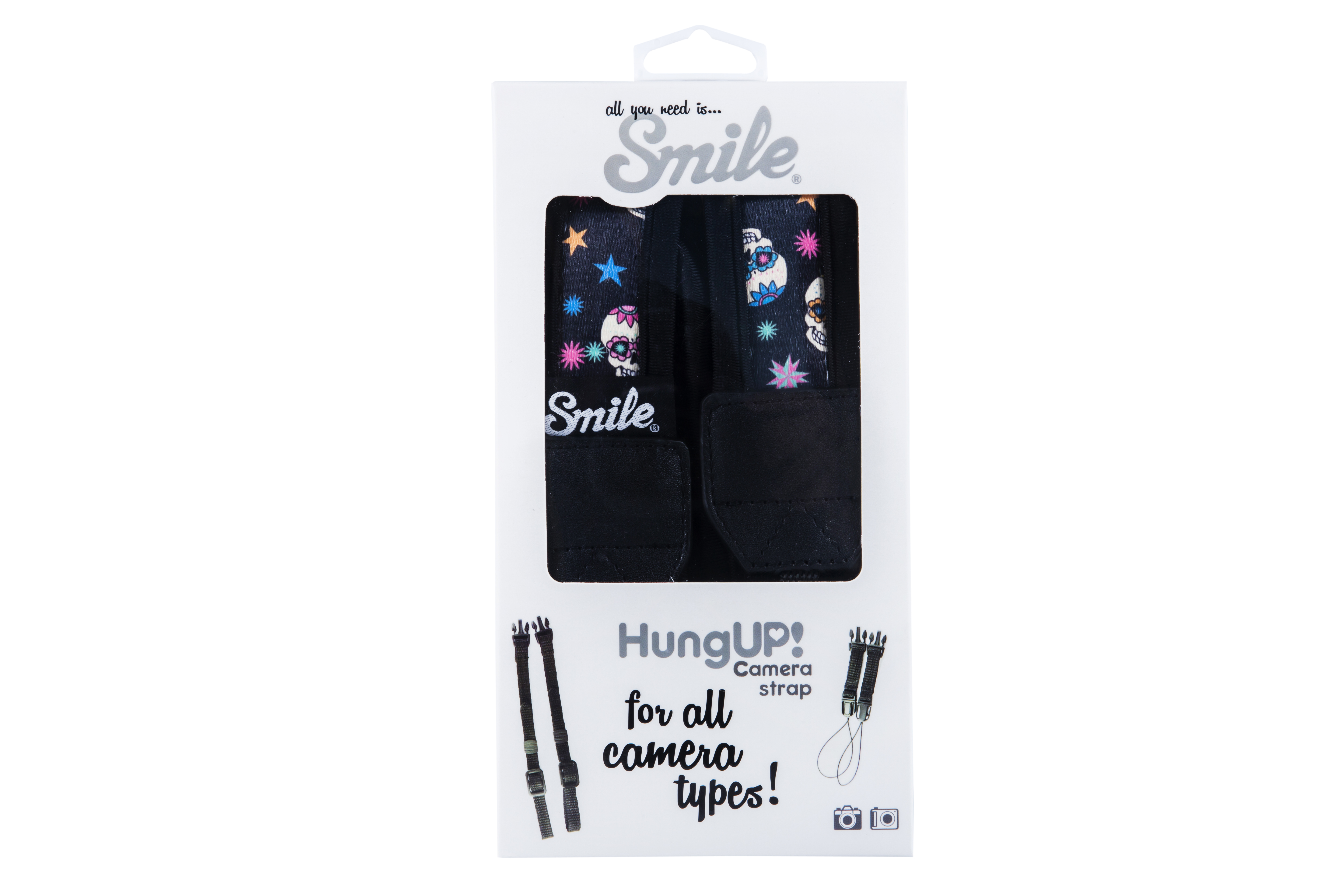 Una correa de cámara en una caja, que muestra un diseño con calaveras, estrellas y la palabra 'Smile'.