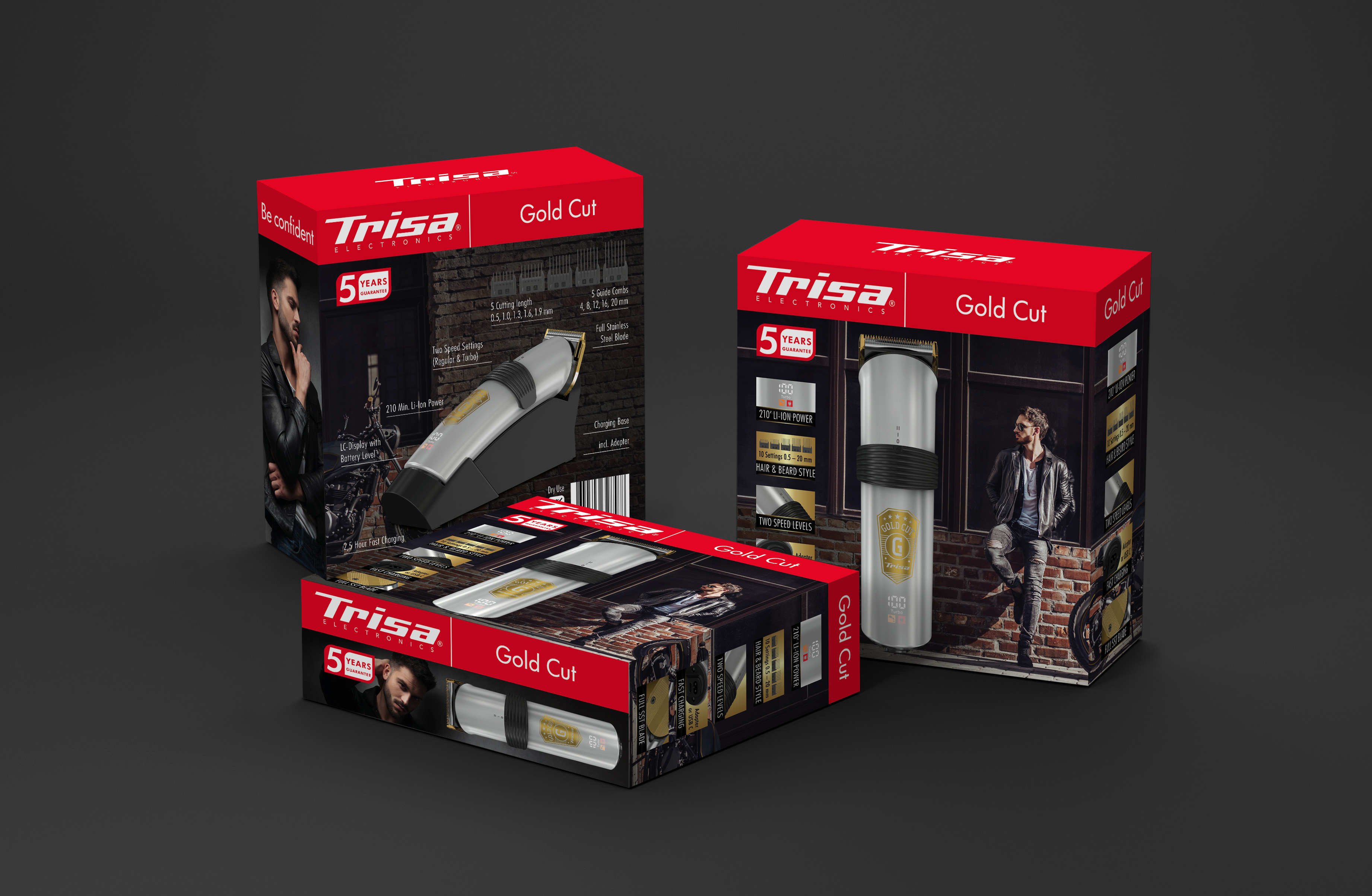 Drei Schachteln Trisa Gold Cut Haarschneidemaschinen, die einen Mann und Produktdetails zeigen.