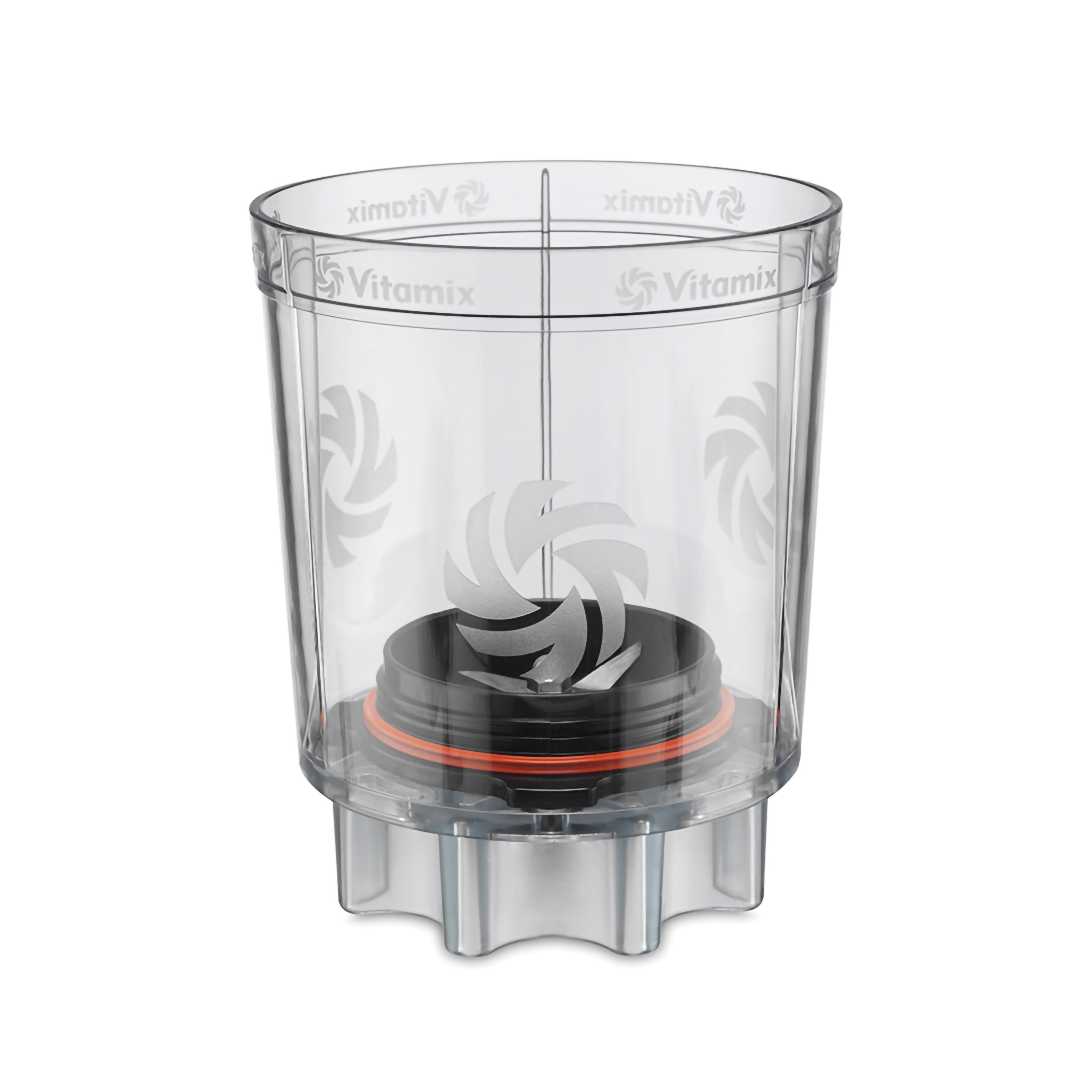 Ein klarer Vitamix-Behälter. Er hat einen schwarzen Boden mit einem orangefarbenen Ring und eine silberne Klinge im Inneren.