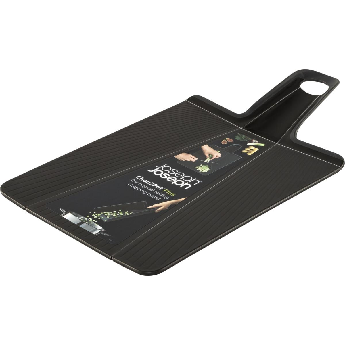 Tabla de cortar plegable negra, vista en ángulo. Muestra la marca y el diseño de la tabla.