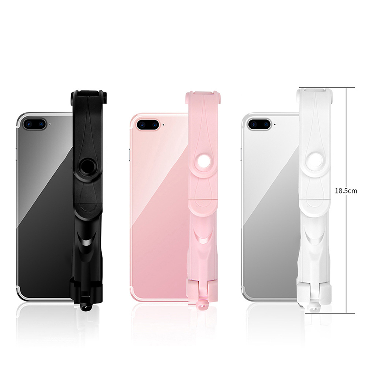 Drei Telefone mit Selfie-Sticks. Schwarz, rosa und weiß. Selfie-Stick ist für jedes gefaltet.