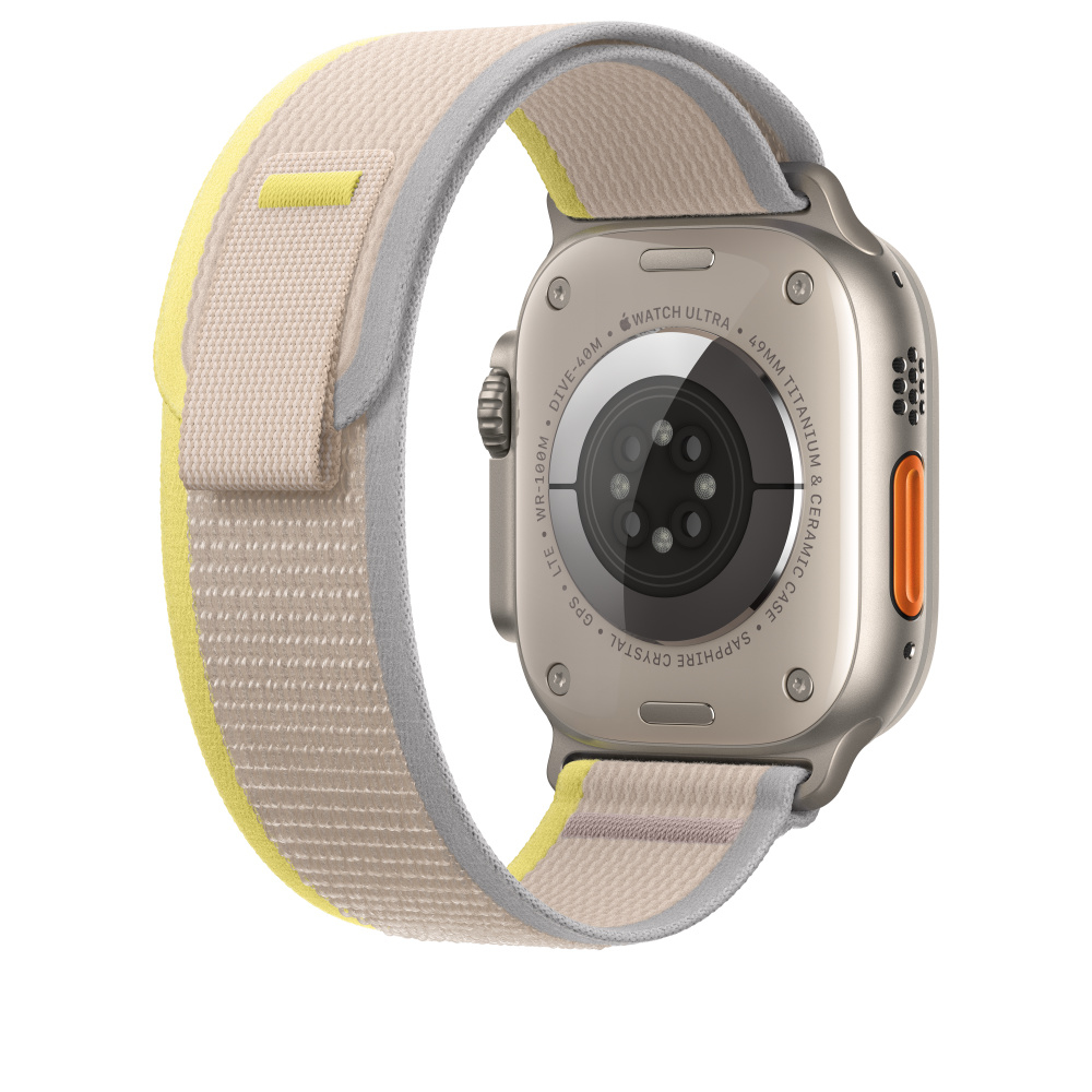 Apple Watch Ultra, back view, tan and yellow band. Shows watch details: Titanium, Sapphire Crystal, GPS.