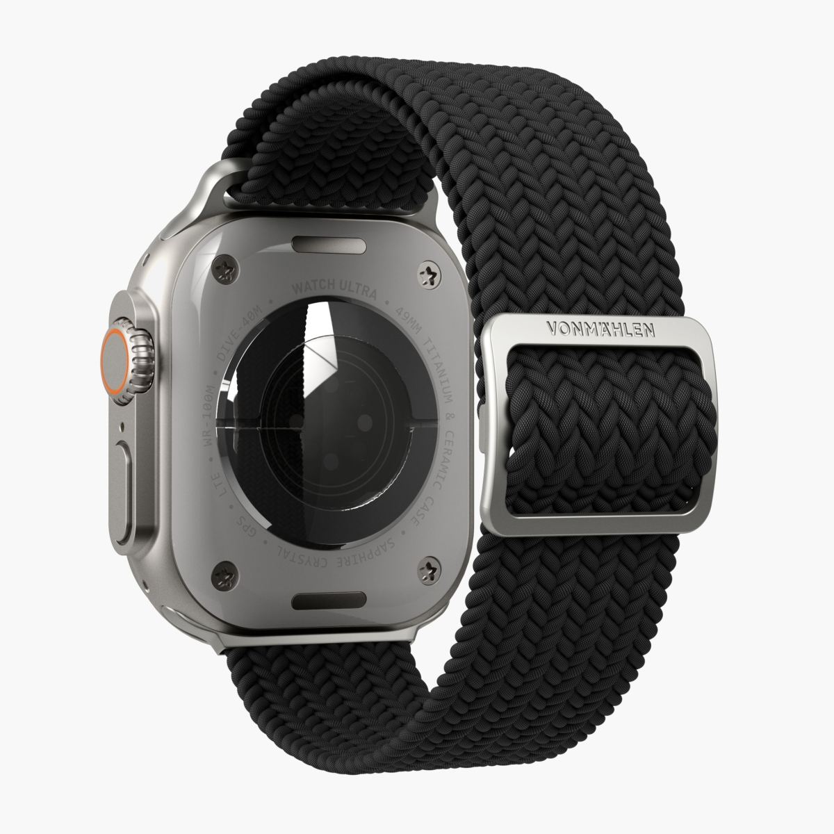 Srebrny Apple Watch Ultra z czarnym plecionym paskiem. Tył pokazuje czujnik i zapięcie Vonmählen.