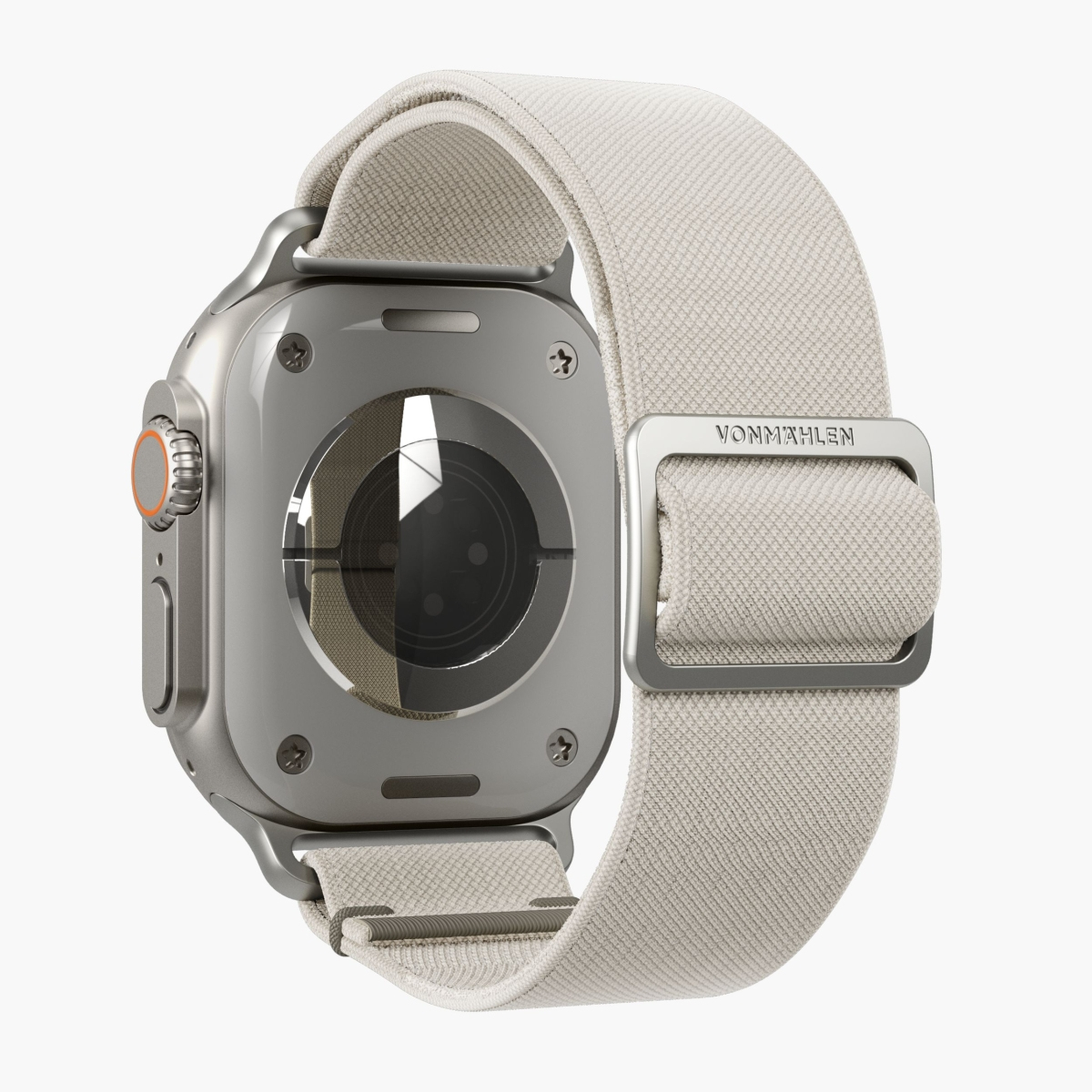 Srebrny smartwatch z białym paskiem. Widoczny jest tył zegarka, ze srebrną klamrą.