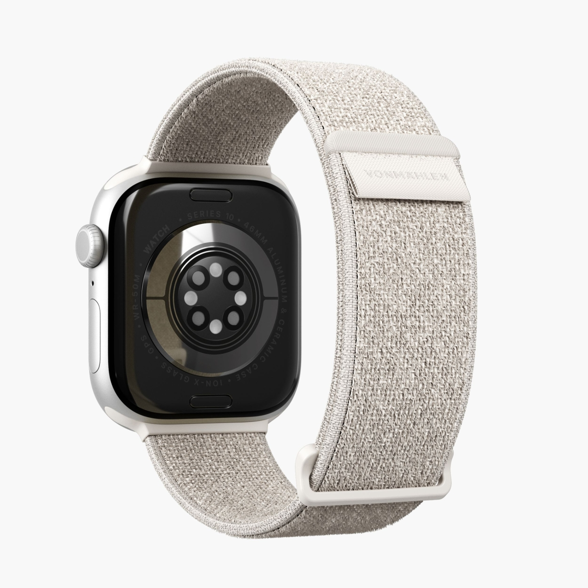 Srebrny Apple Watch, jasnobeżowy pasek. Tył pokazuje czujniki.