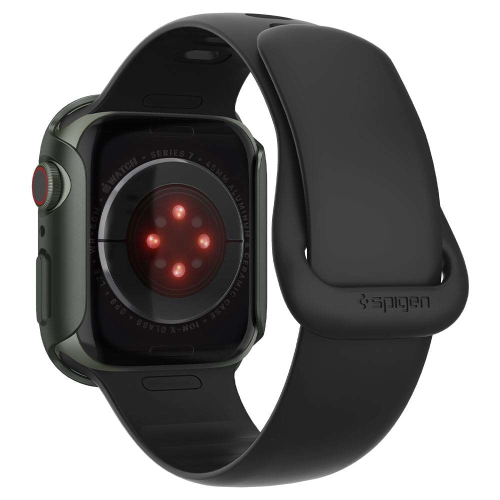Czarny Apple Watch z czarnym paskiem, tył z czujnikami i logo Spigen.