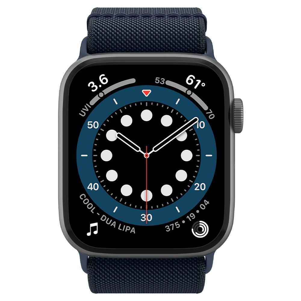 Apple Watch with blue band, showing the watch face with time and cool-dua lipa info.