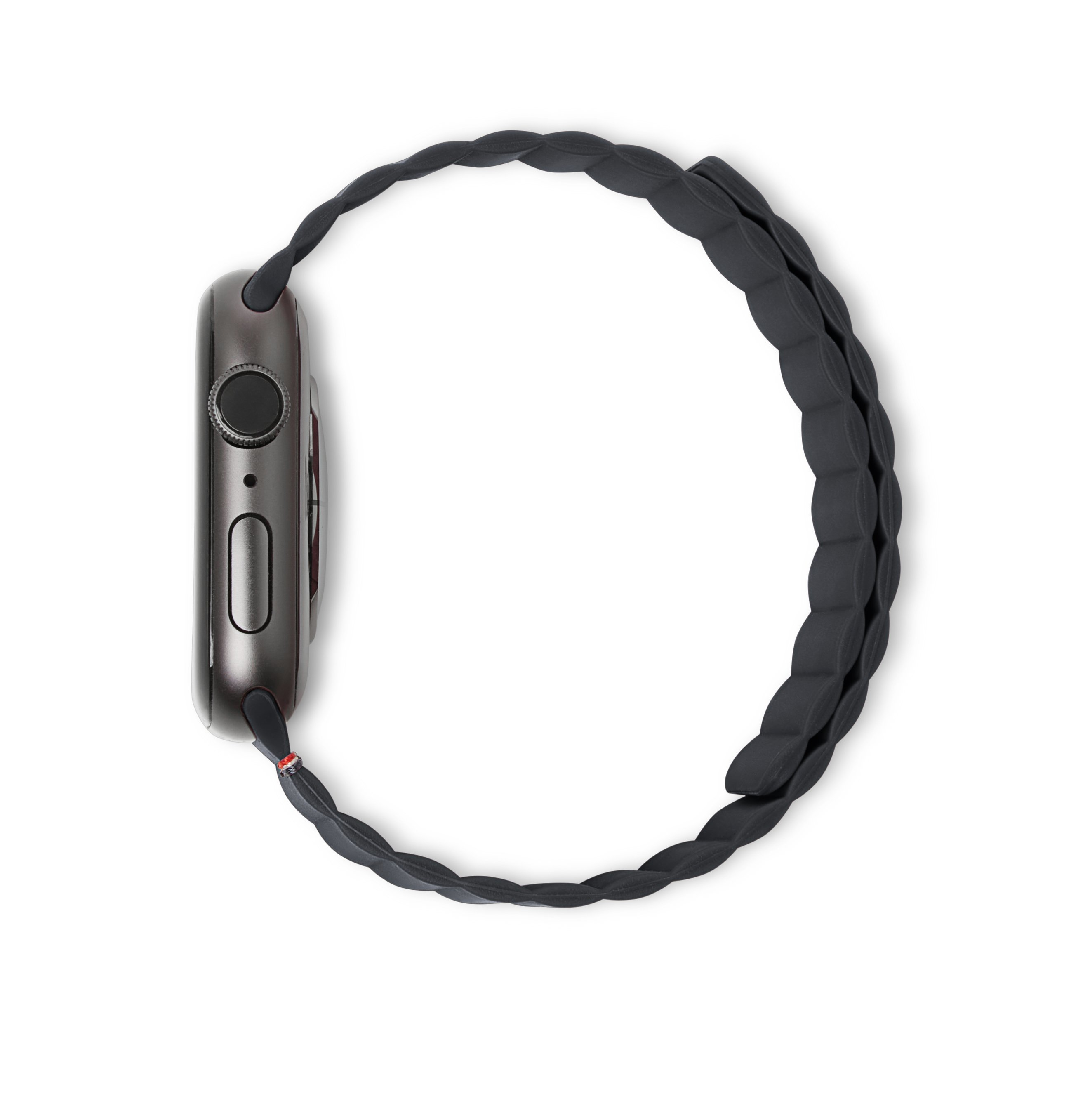 Apple Watch z czarnym paskiem. Zegarek umieszczony jest w widoku z góry.