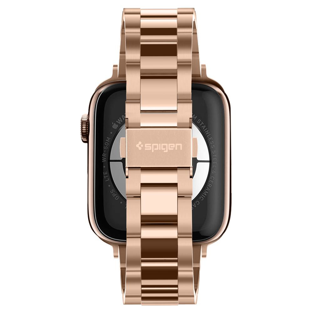 Il retro di un Apple Watch dorato con cinturino in metallo dorato. Il retro mostra i sensori.