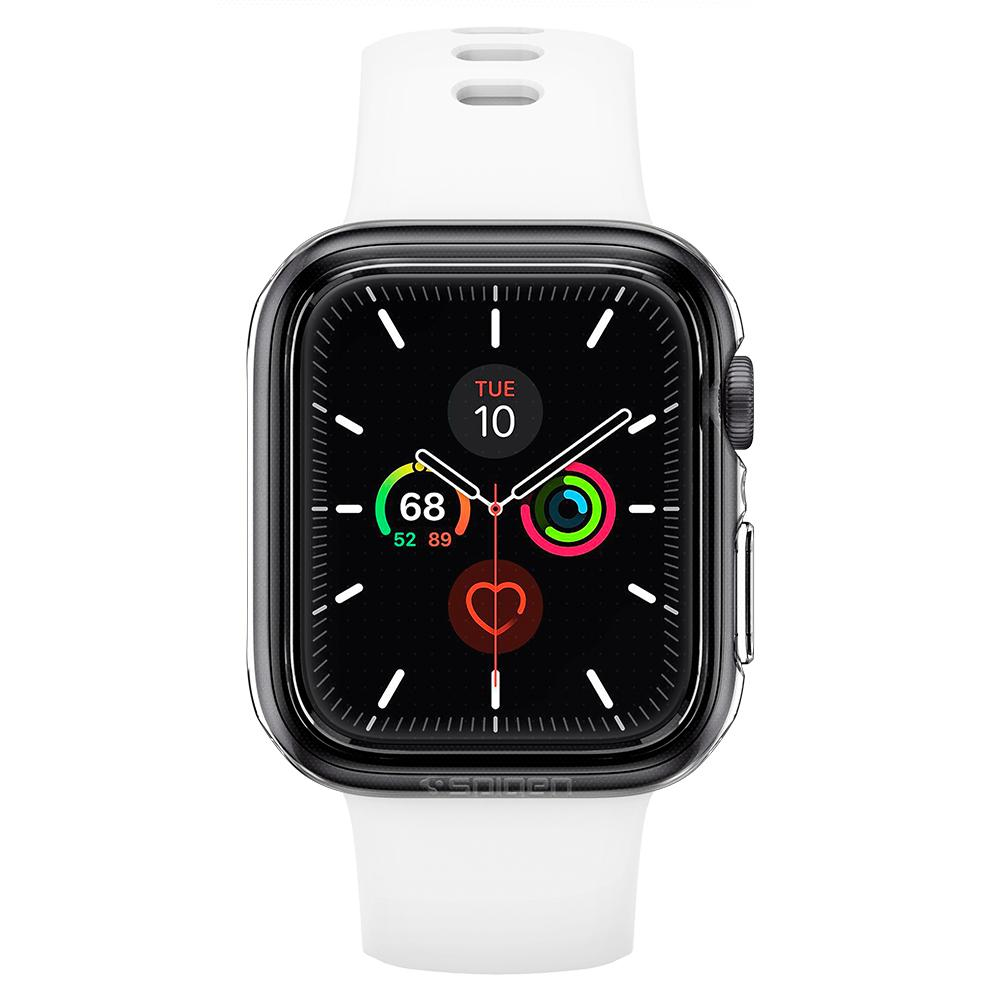 White watch with a white strap. The watch face shows the time, a heart icon, and other data.