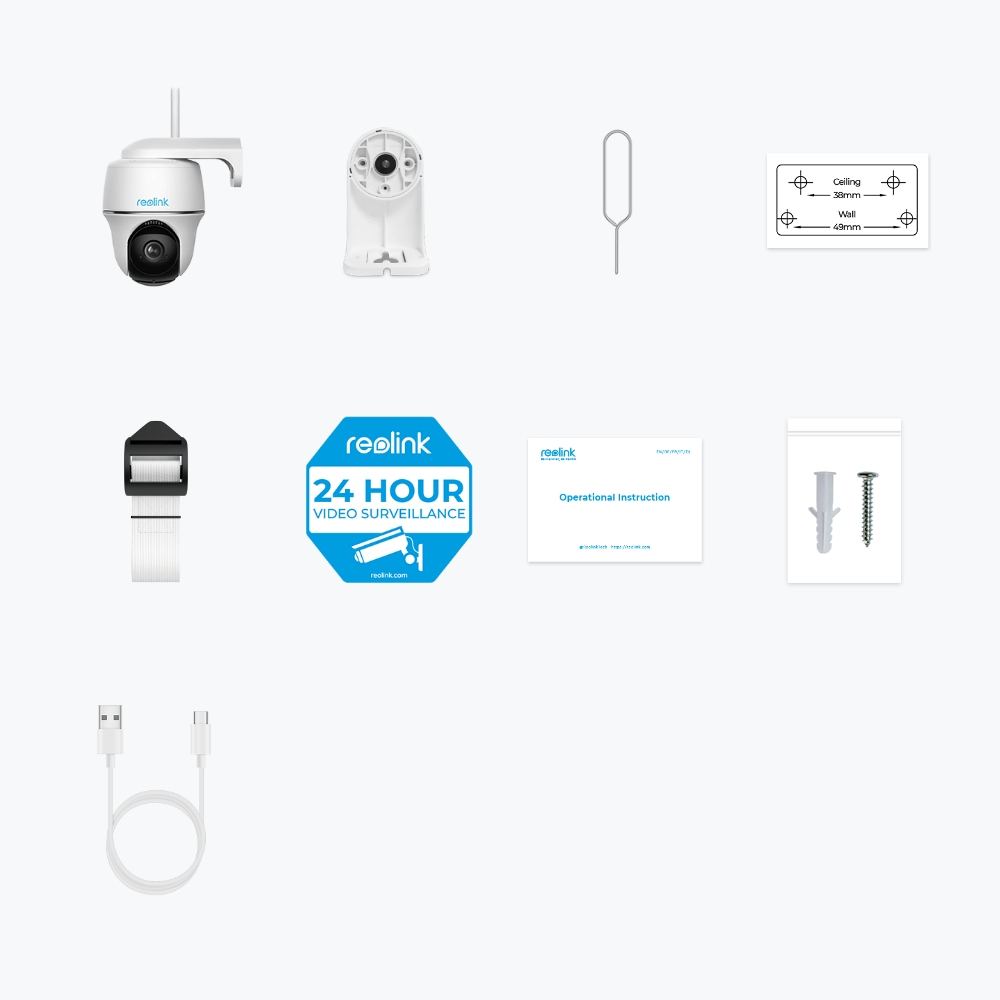 Różne elementy systemu kamer monitoringu. Zawiera kamerę, kable i instrukcje montażu.