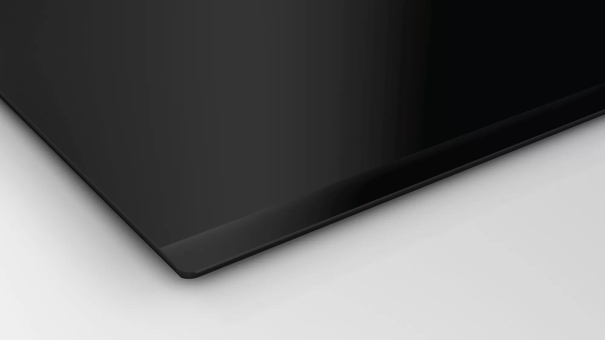 Vista trasera de un monitor ASUS con soporte y varios puertos.