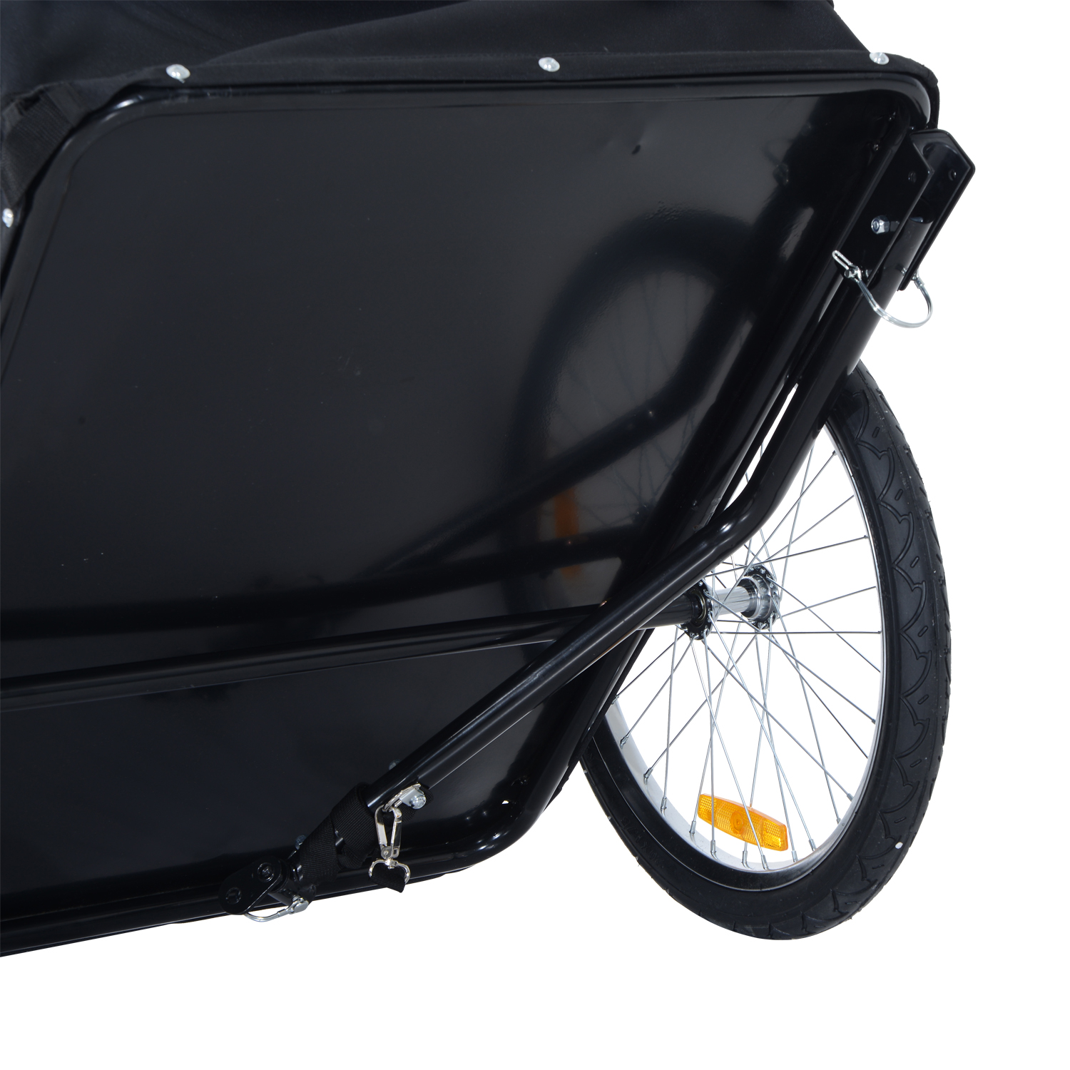 Nahaufnahme des Fahrradanhängers mit schwarzer Struktur, Rad und Reflektor.