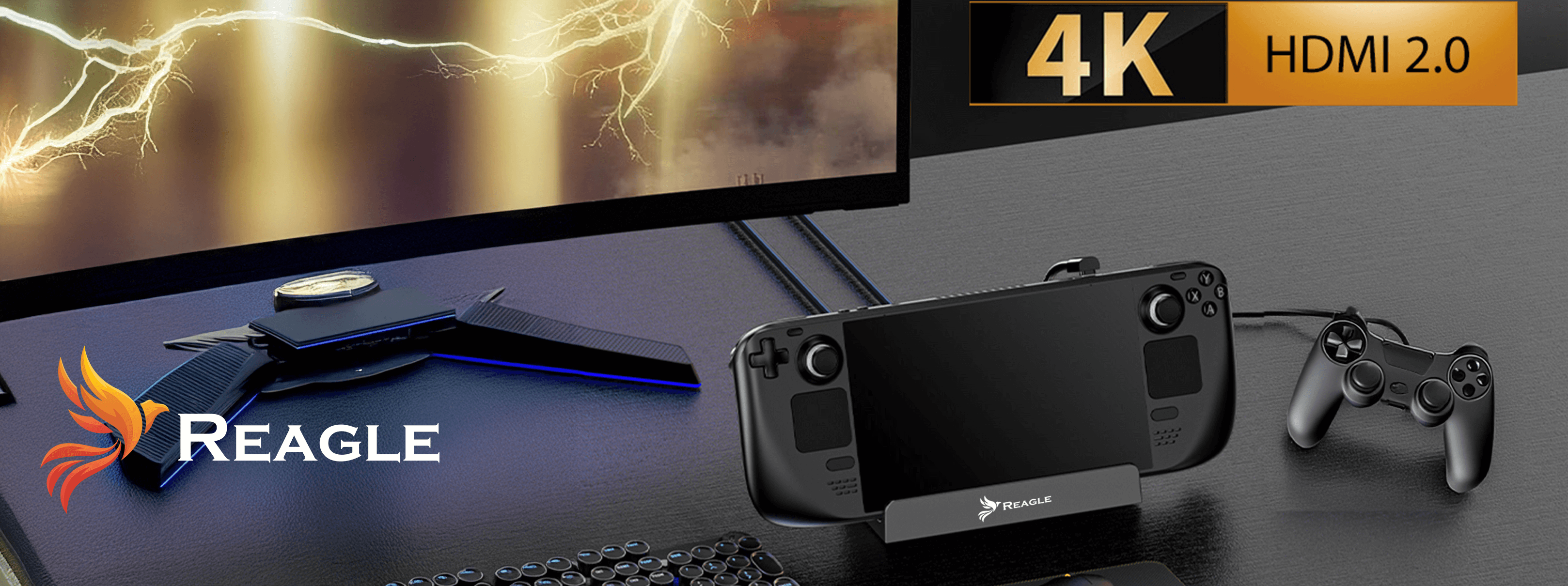 Konfiguracja do gier obejmuje monitor, konsolę w stacji dokującej i gamepad. Widoczne jest logo Reagle.