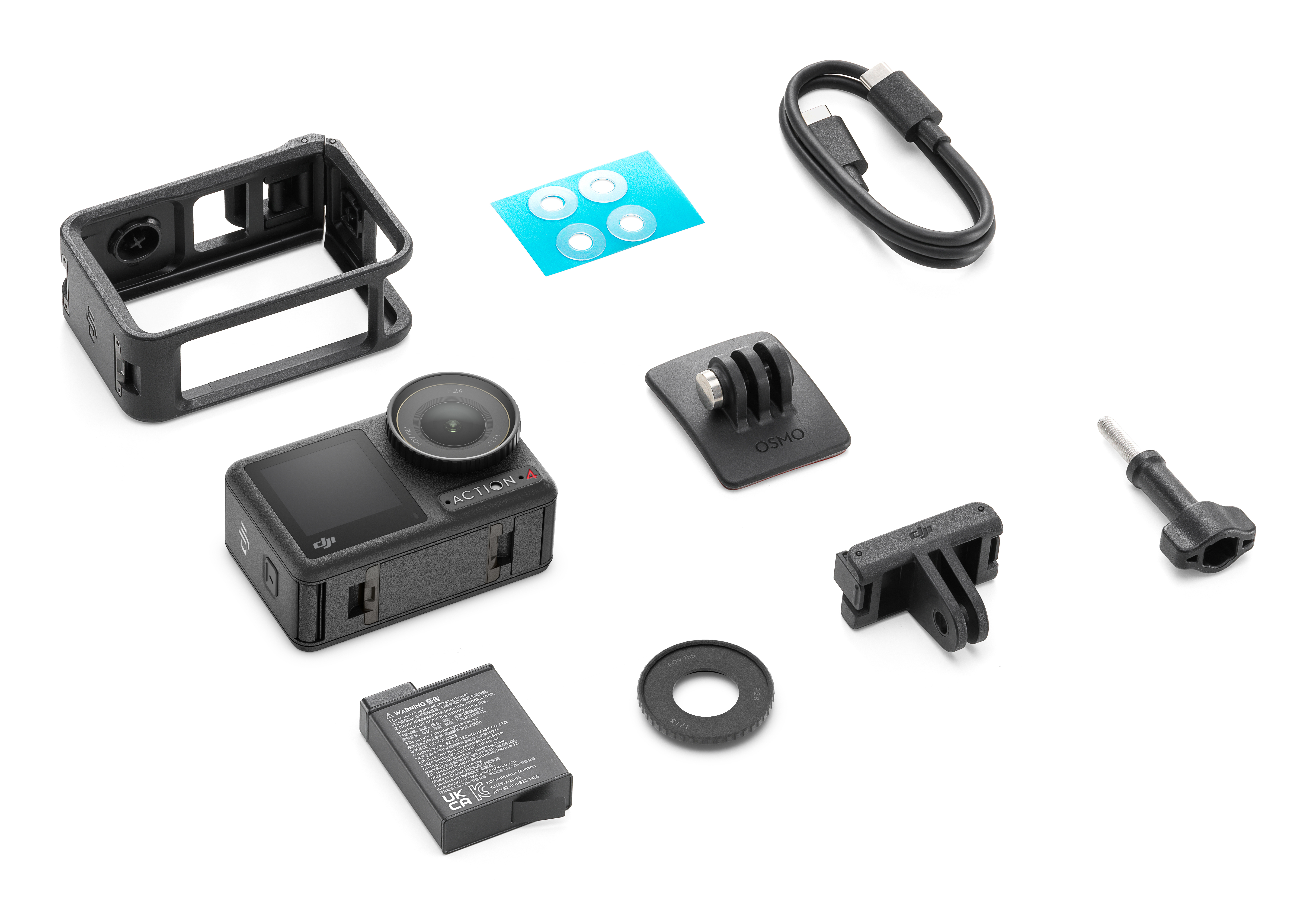 Kamera sportowa DJI z akcesoriami. Zawiera kamerę, baterię, mocowanie i inne małe części.