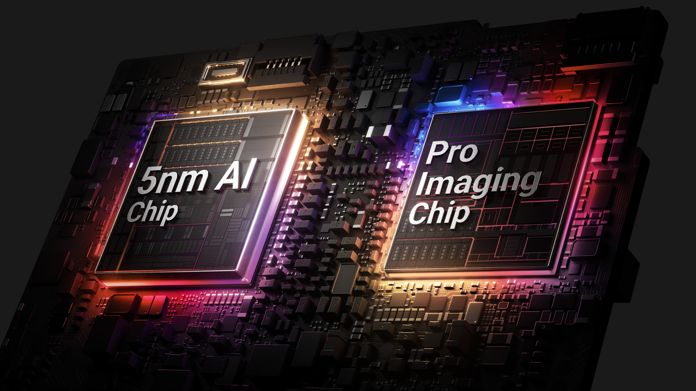 Zbliżenie płytki obwodu z dwoma układami scalonymi oznaczonymi: 5nm AI Chip i Pro Imaging Chip.