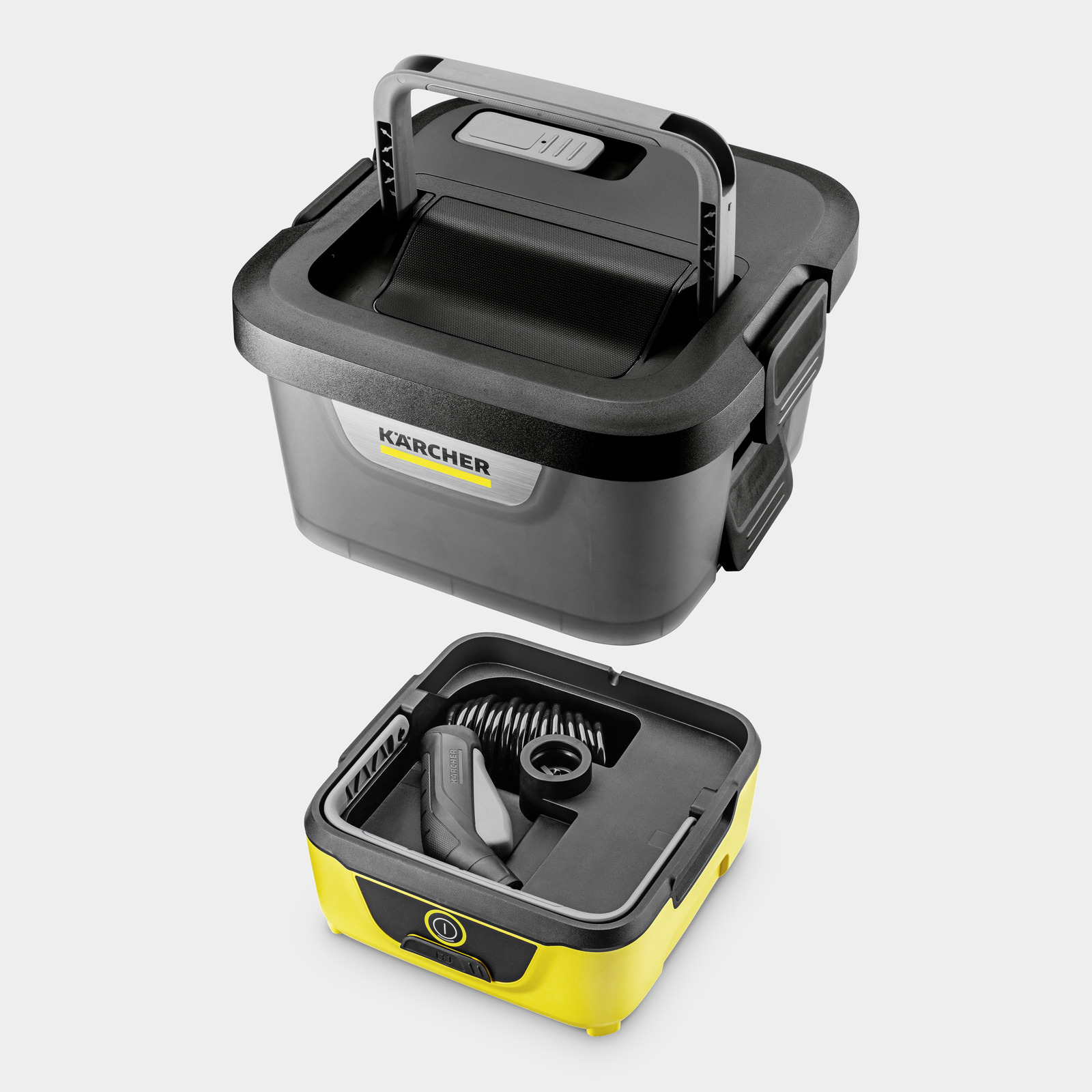 Een zwarte en grijze Karcher-container, open om twee compartimenten met accessoires te onthullen.