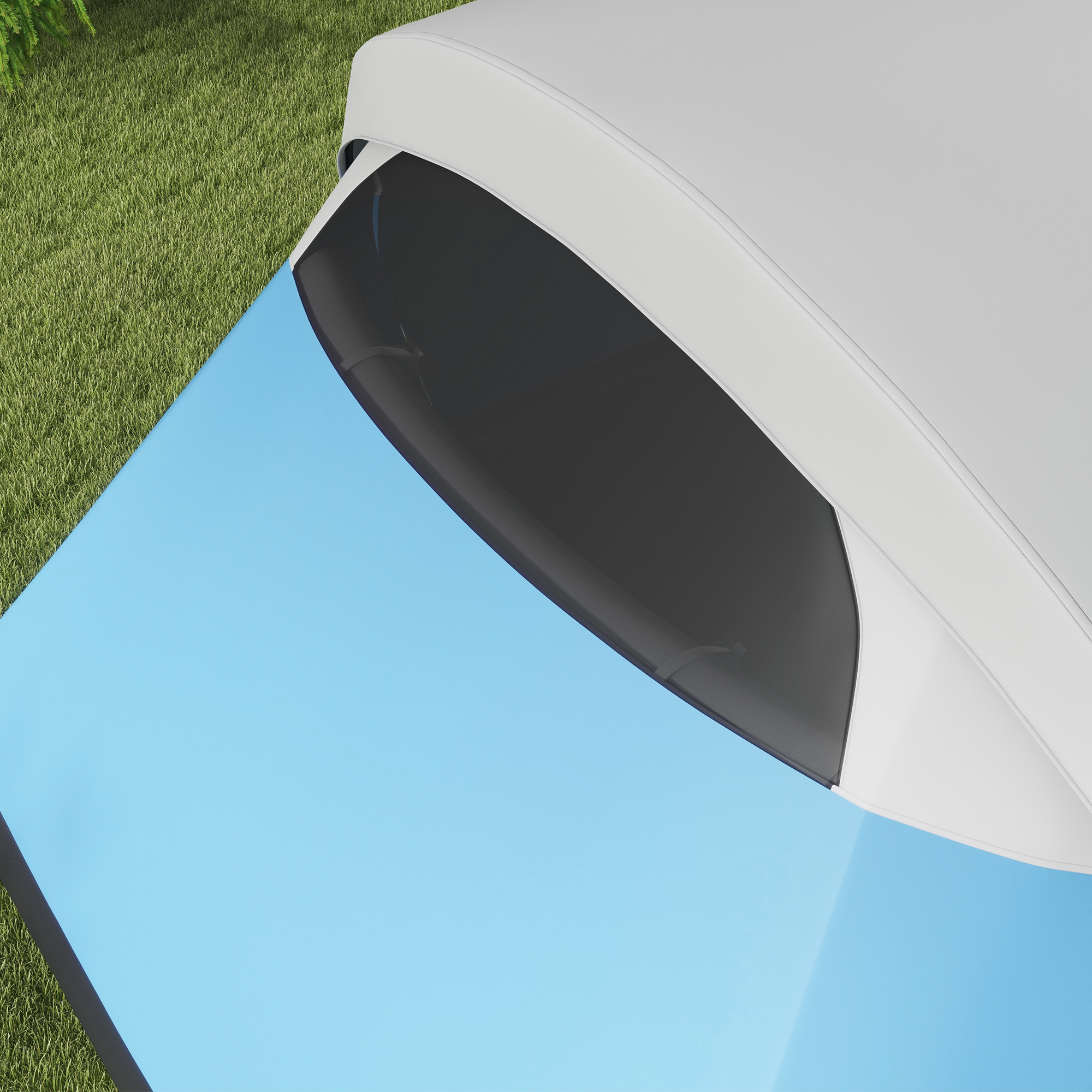 Eine Draufsicht auf ein blaues und weißes Zelt auf Gras.